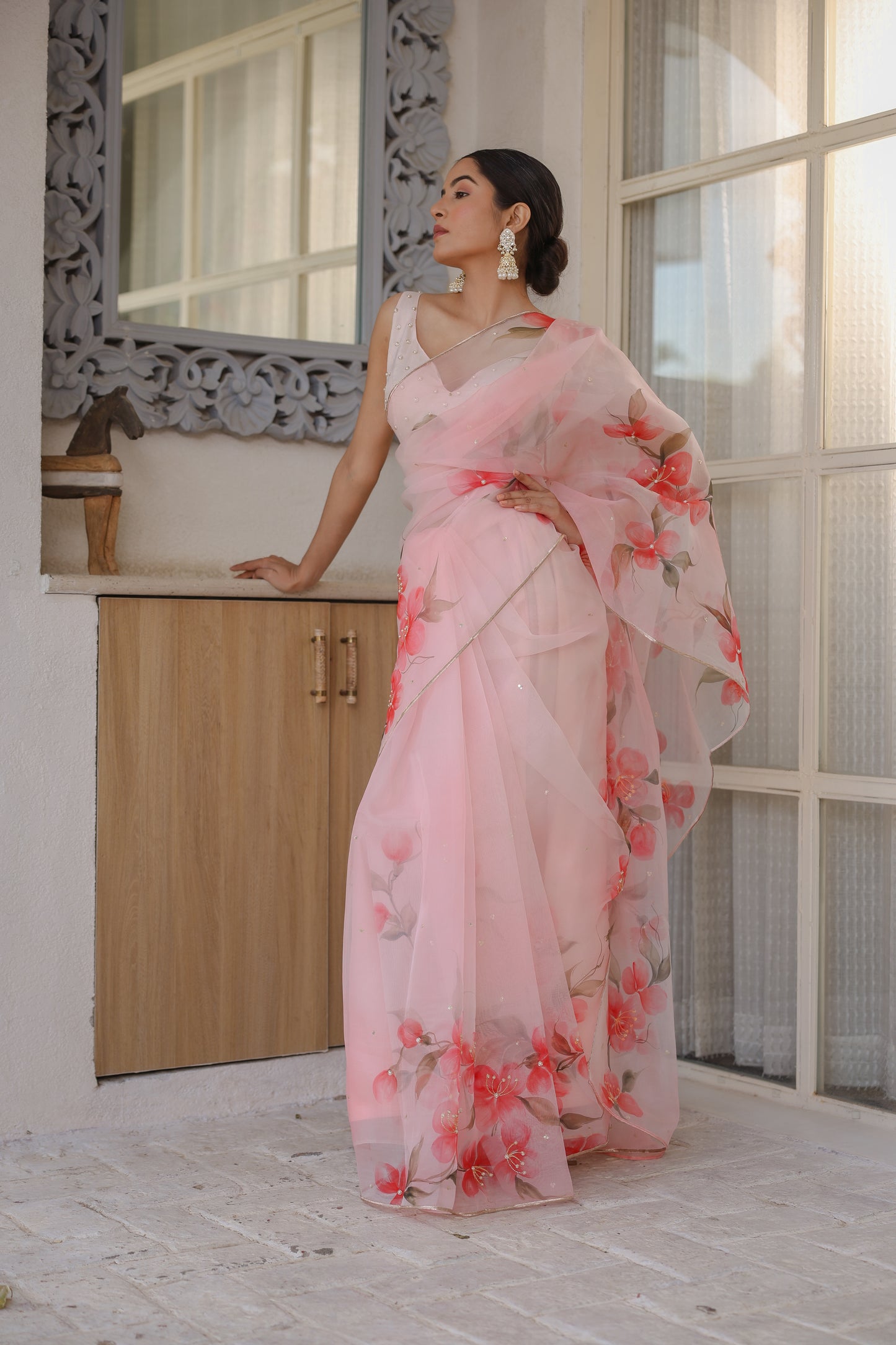 Hand-painted powder pink floral silk organza saree