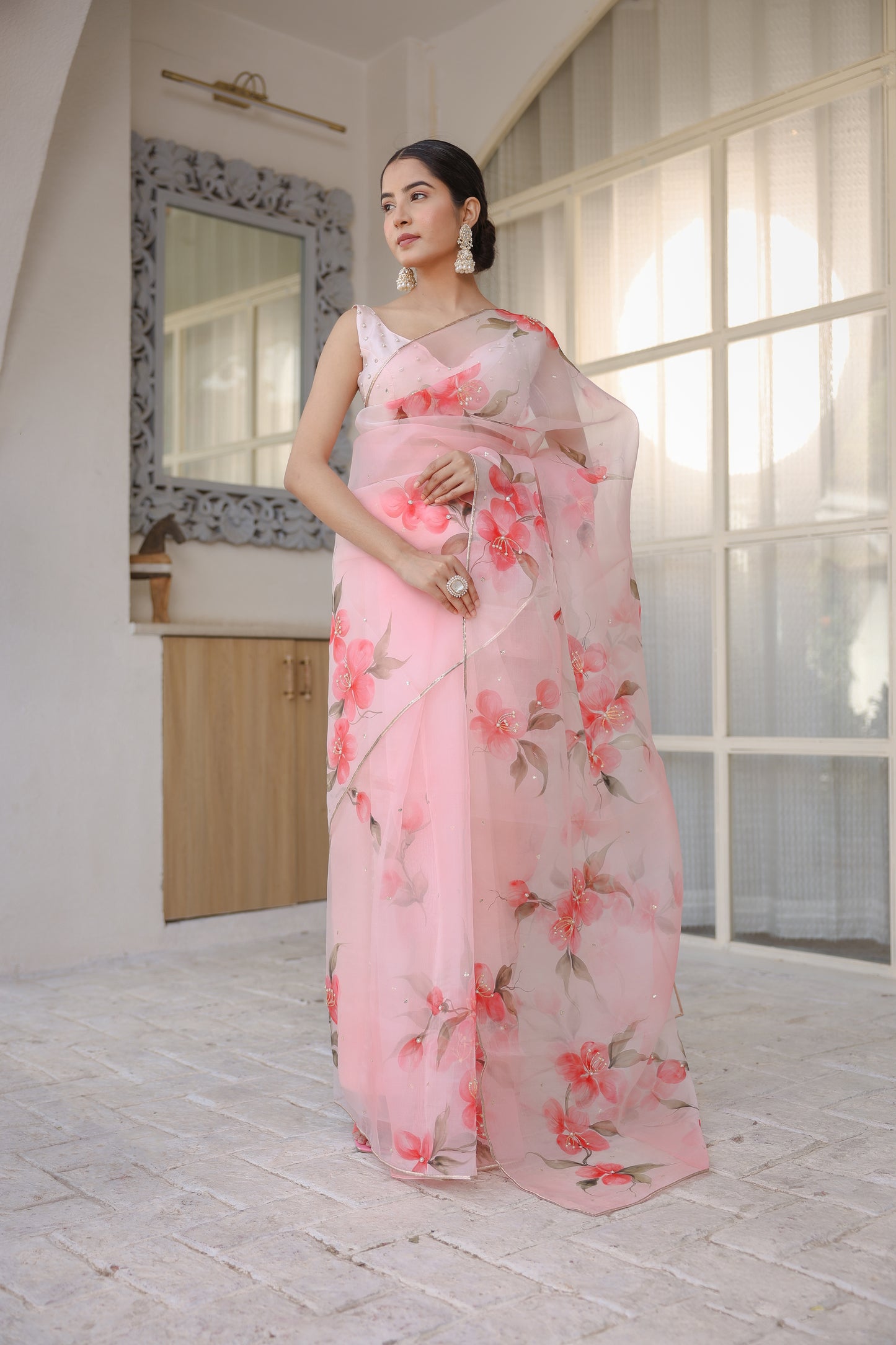 Hand-painted powder pink floral silk organza saree