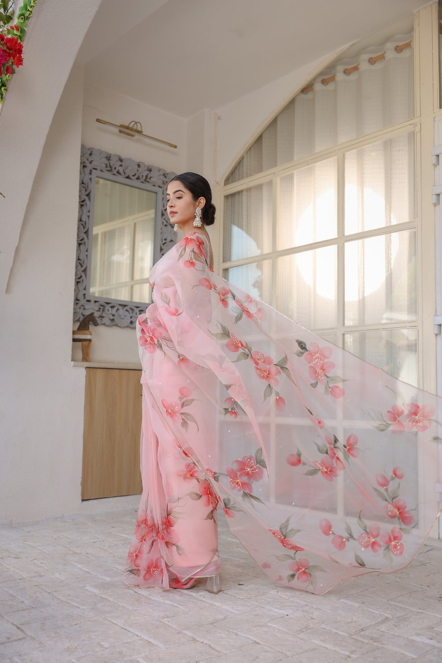 Hand-painted powder pink floral silk organza saree