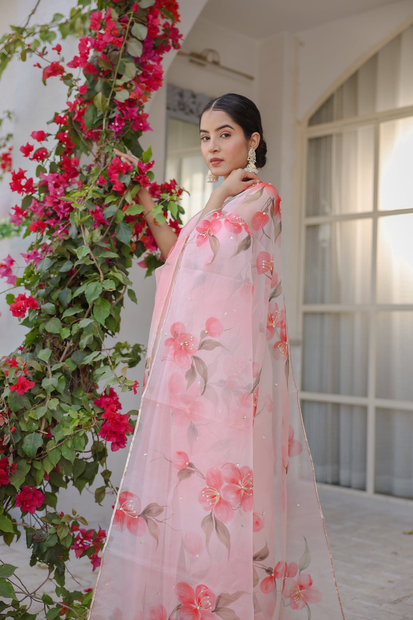 Hand-painted powder pink floral silk organza saree