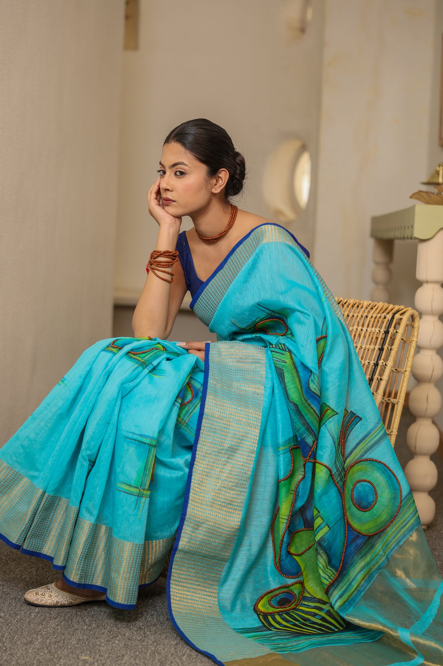Hand-painted turquoise blue handloom cotton silk saree