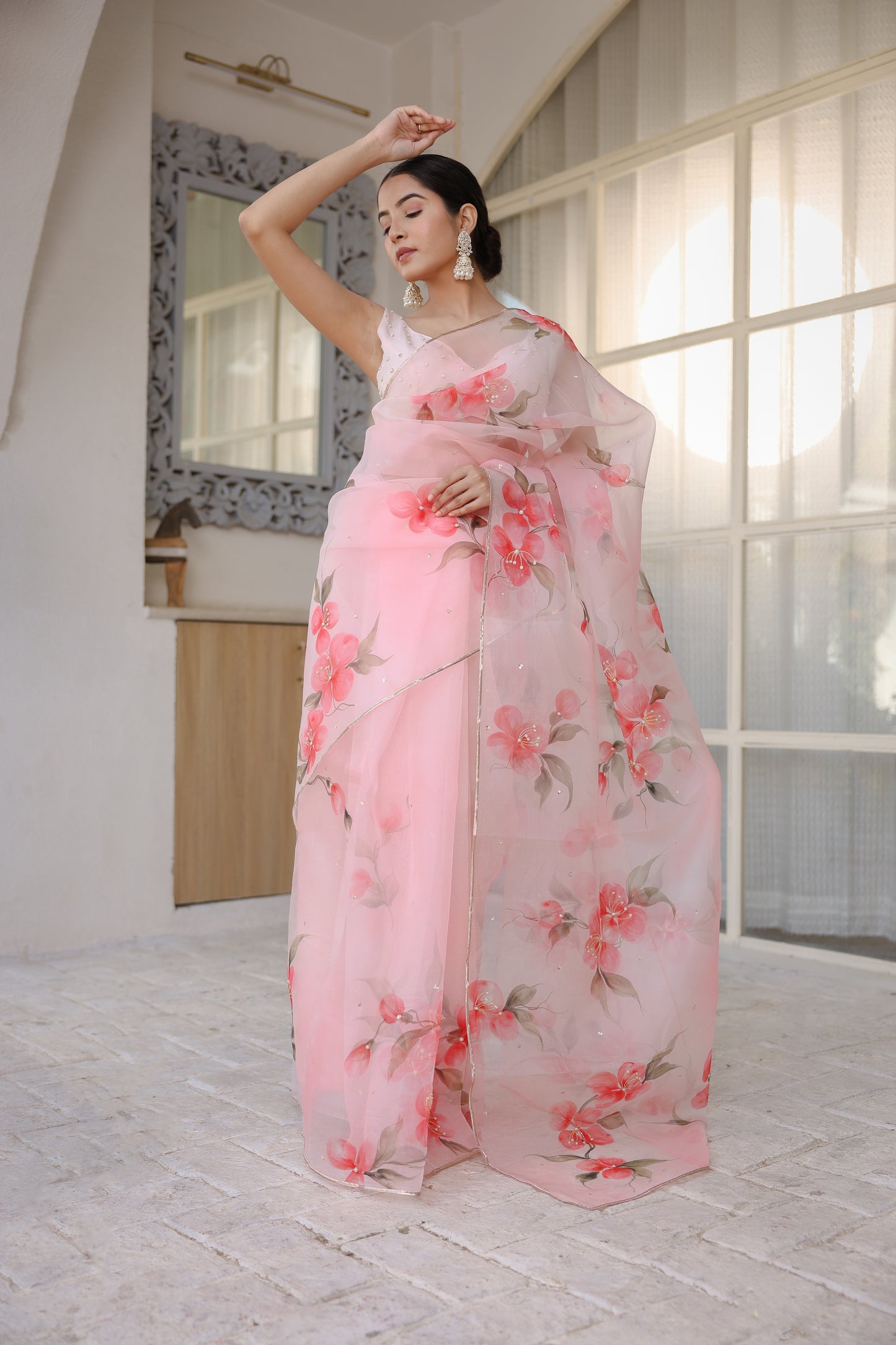 Hand-painted powder pink floral silk organza saree