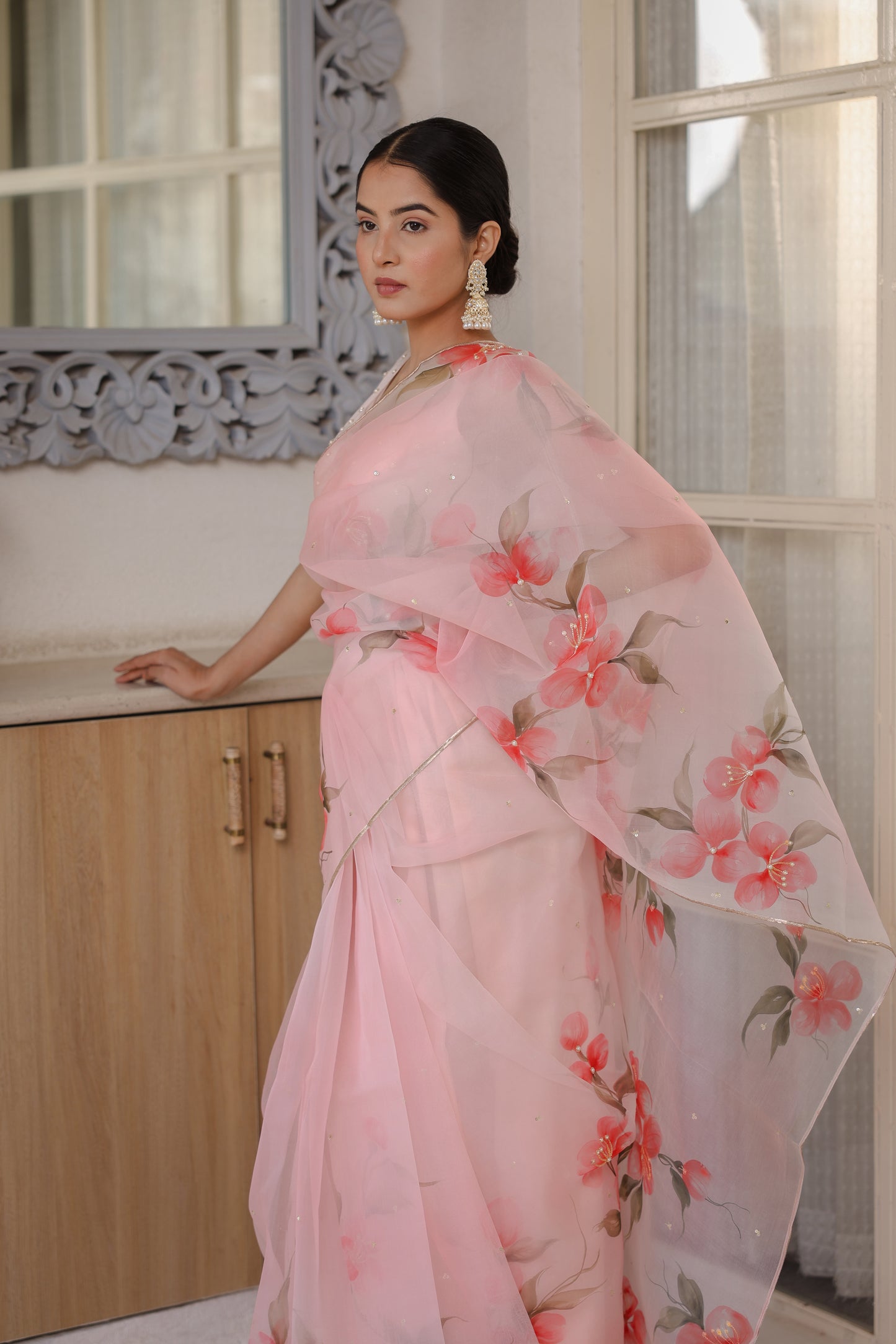Hand-painted powder pink floral silk organza saree