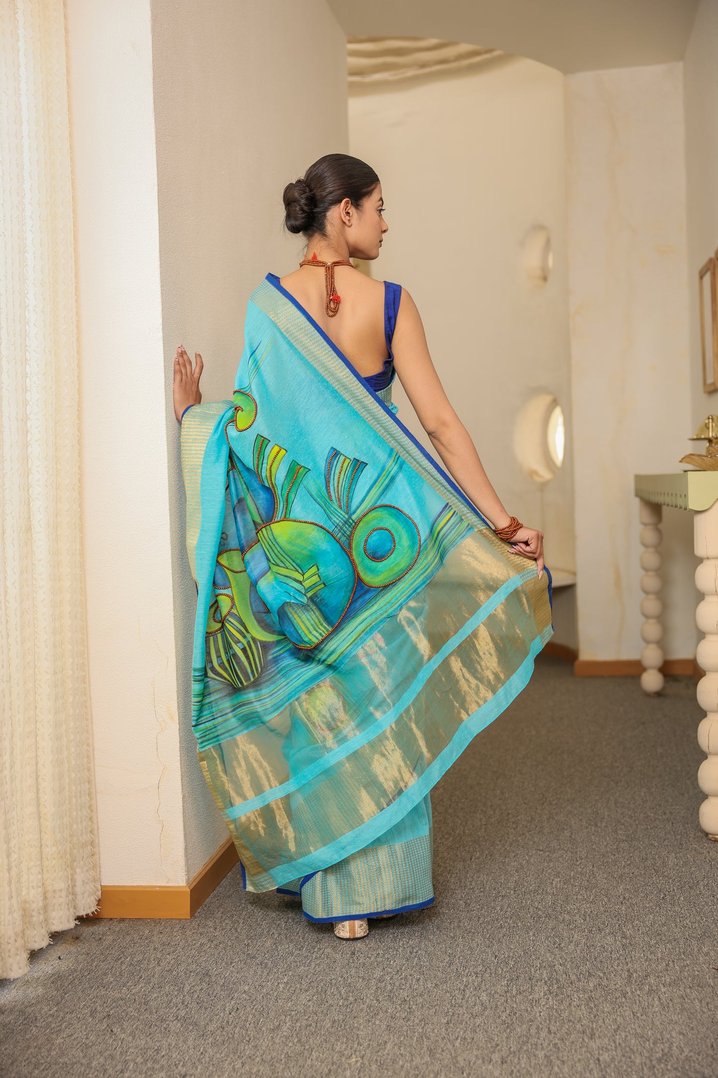 Hand-painted turquoise blue handloom cotton silk saree