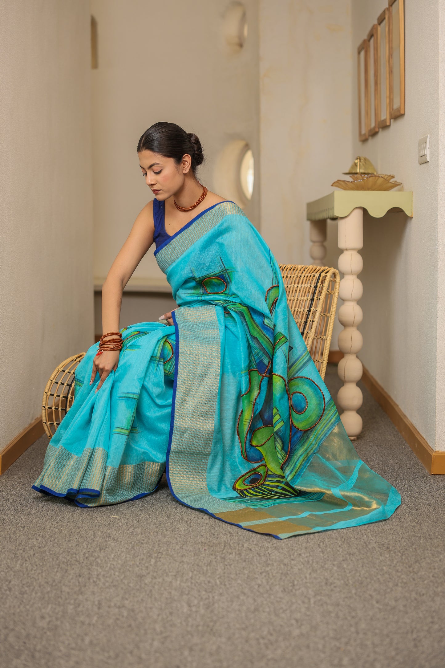 Hand-painted turquoise blue handloom cotton silk saree