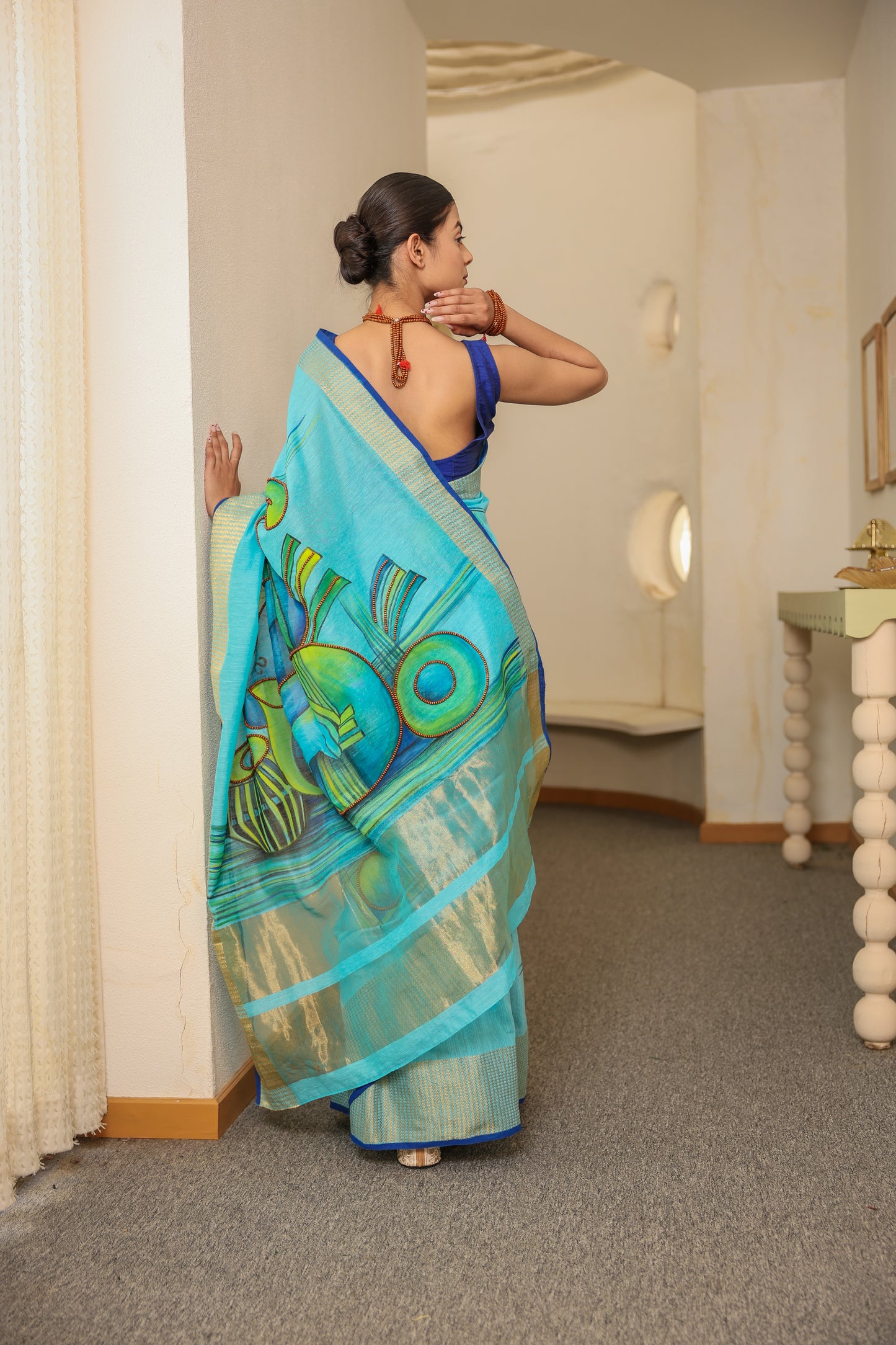 Hand-painted turquoise blue handloom cotton silk saree