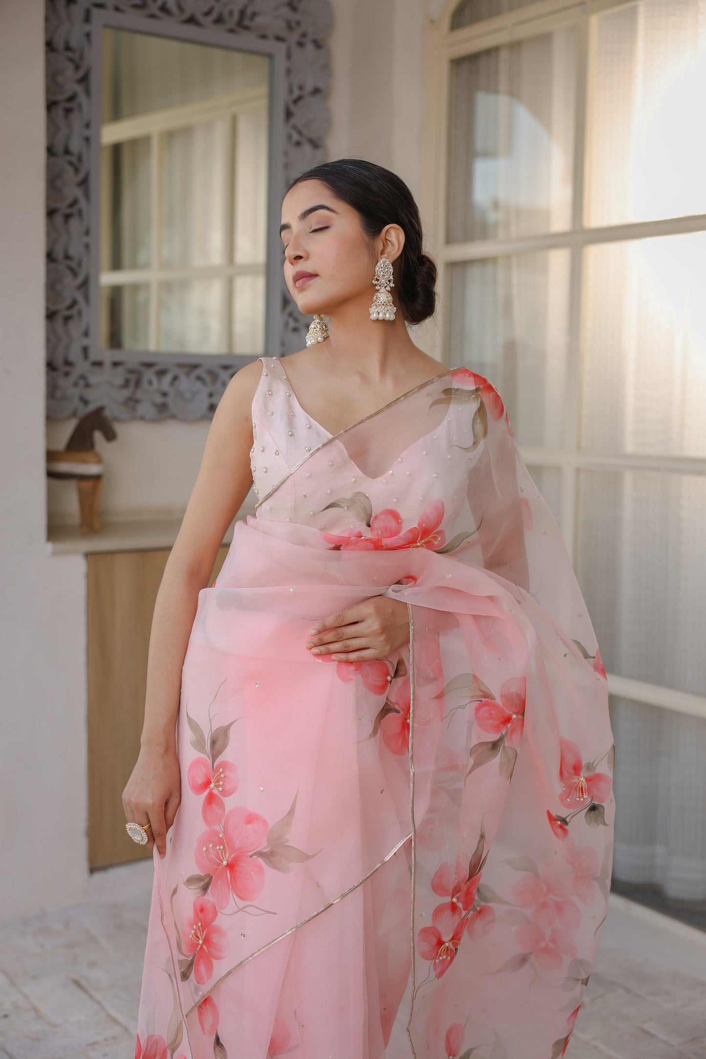 Hand-painted powder pink floral silk organza saree