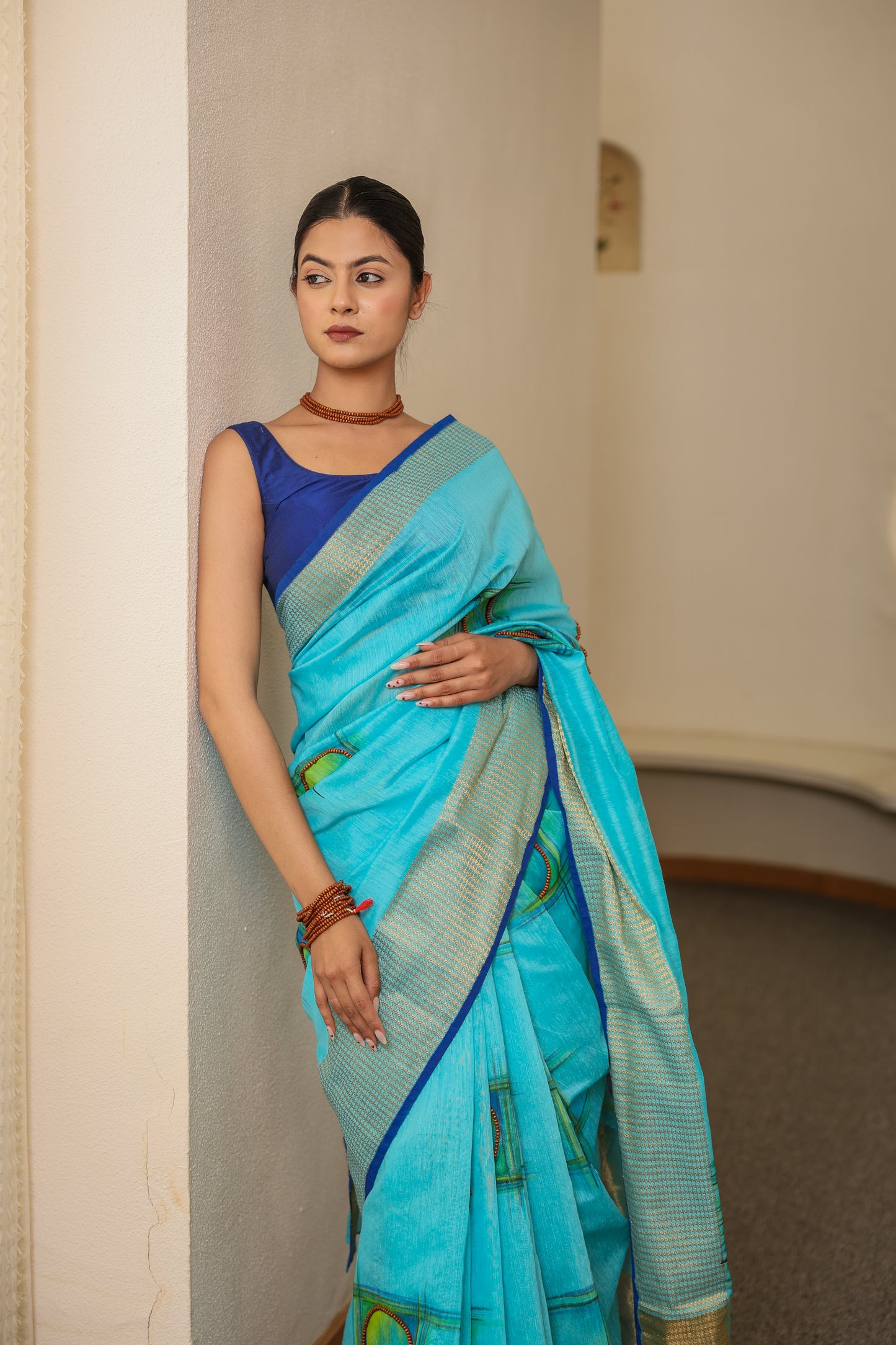 Hand-painted turquoise blue handloom cotton silk saree