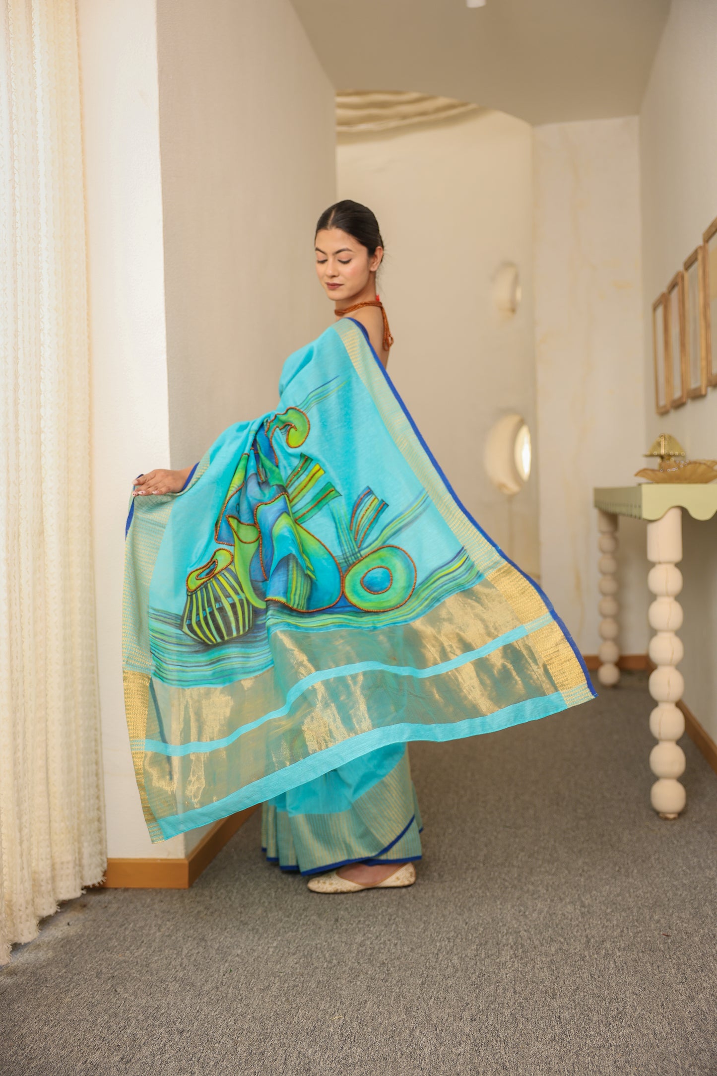 Hand-painted turquoise blue handloom cotton silk saree