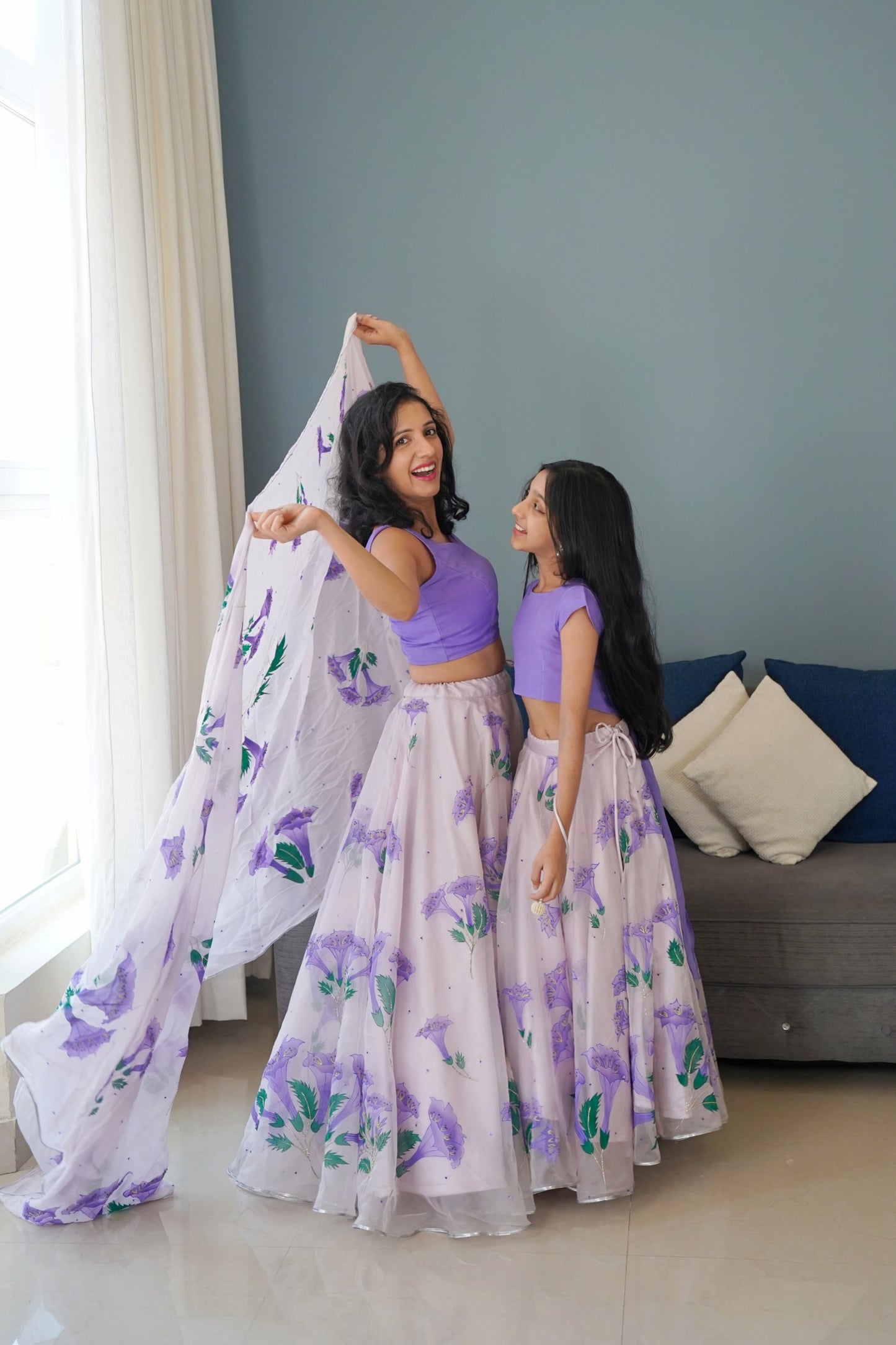Nivi & Ishanvi's Lilac Bell Flower Twinning Lehengas Set