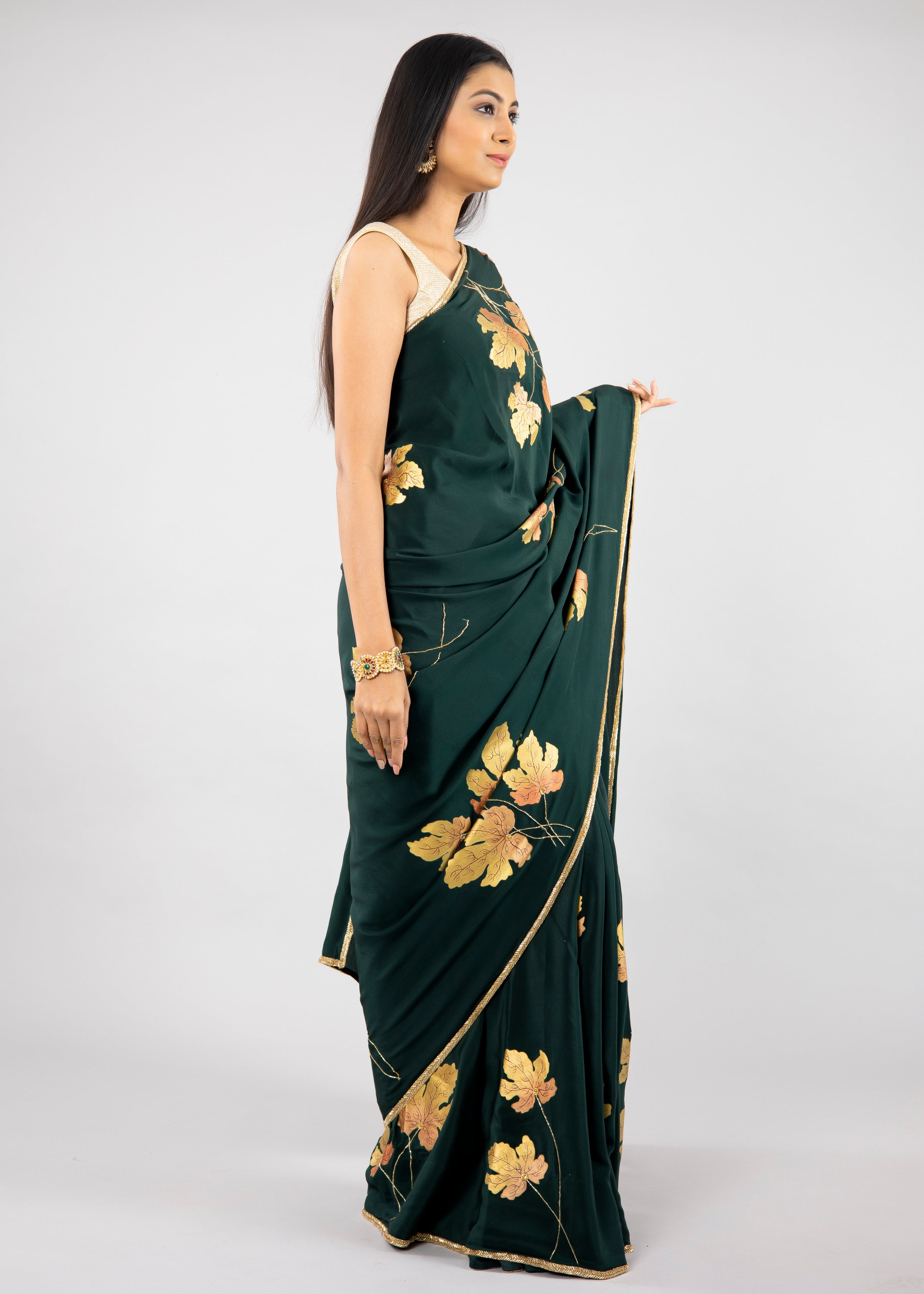 Hand-Painted and Hand-Embroidered Bottle Green Pure Crepe Silk Golden Maple Saree