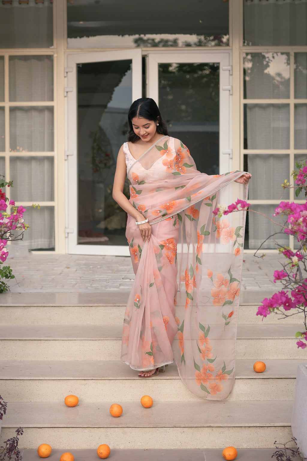 Handpainted and Handembroidered peach Pure Silk Organza Floral Saree