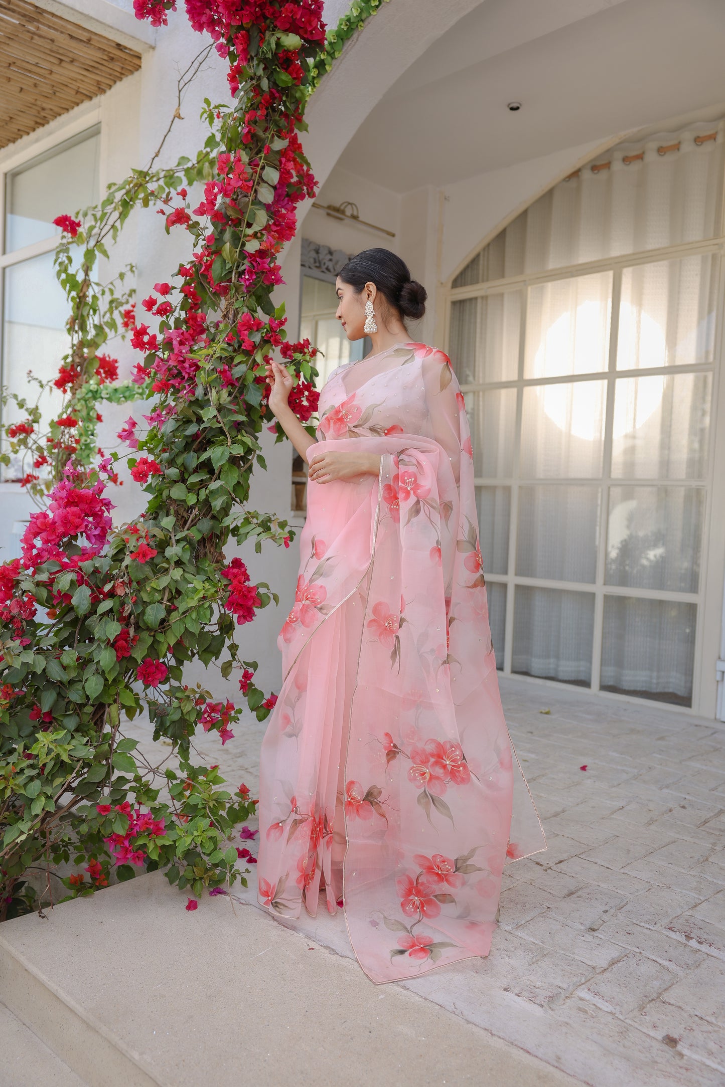 Hand-painted powder pink floral silk organza saree