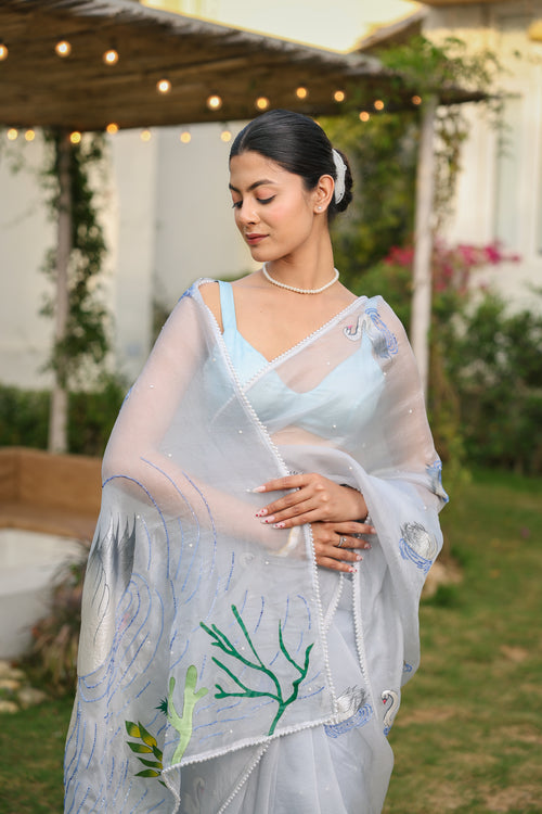 Handpainted and Hand embroidered Pastel Blue Pure Silk Organza Swan Saree