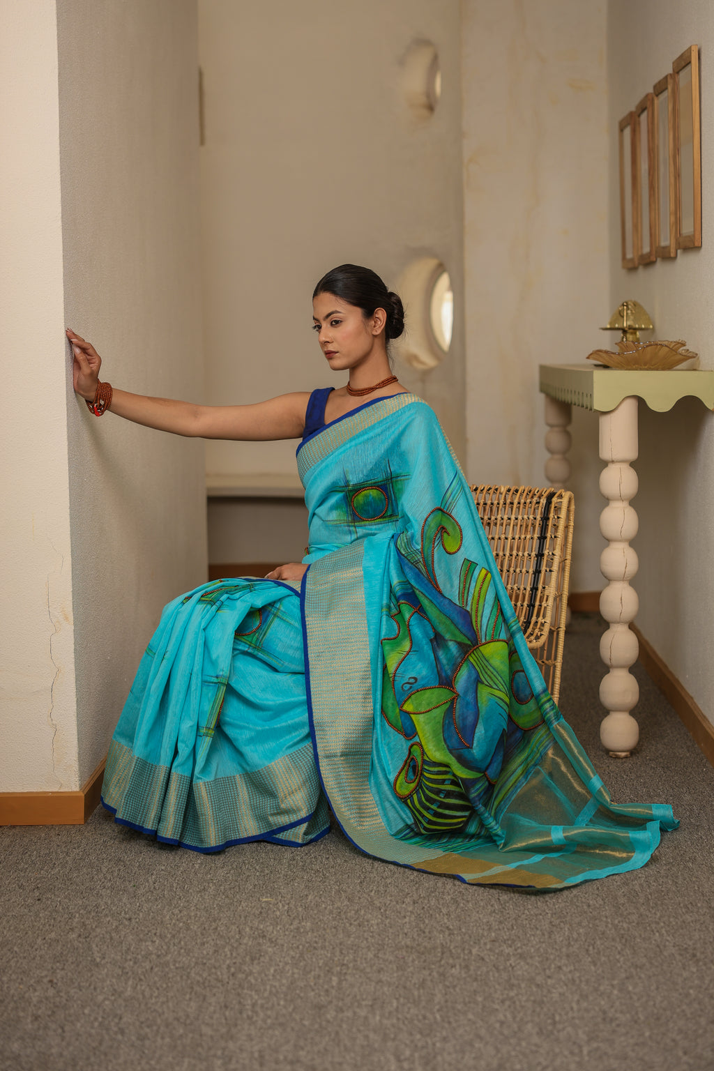 Handpainted and Hand embroidered Turquoise Blue khadi Silk Saree