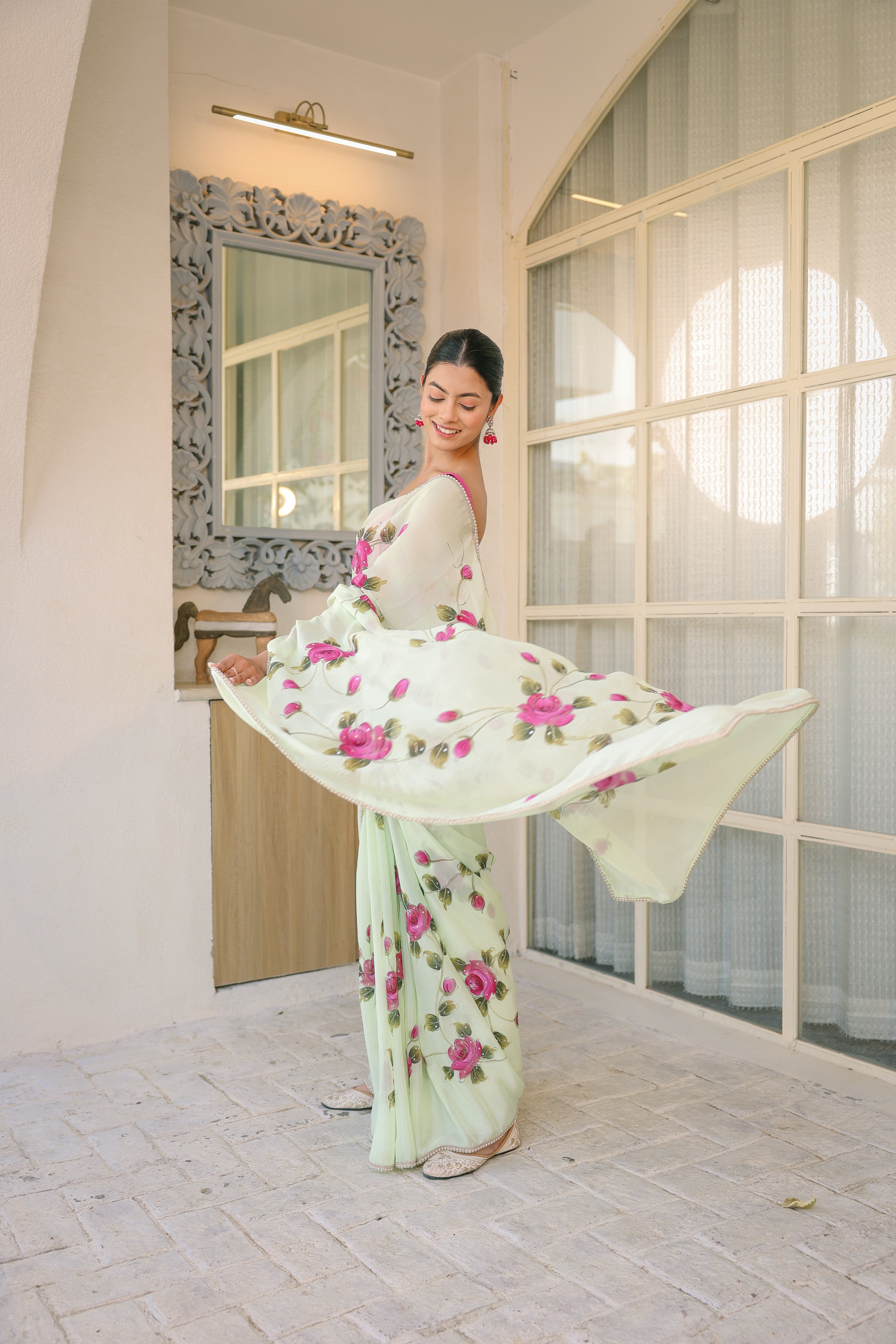 Handpainted and Hand embroidered Pastel Green Natural Crepe Saree