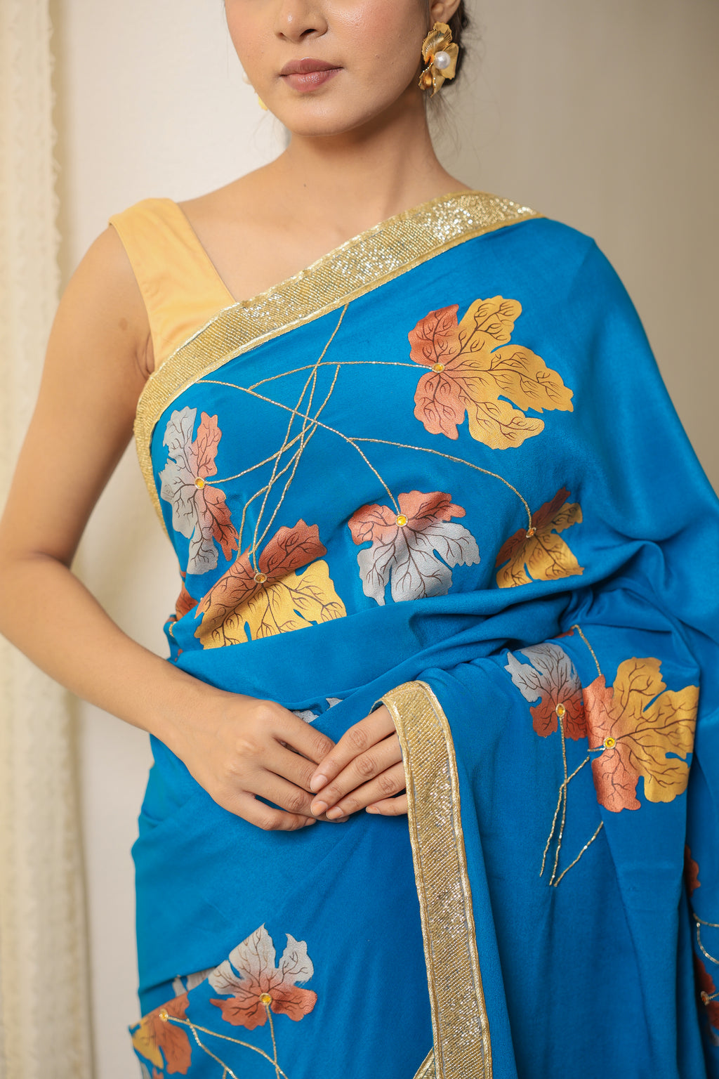 Handpainted and Hand embroidered Turquoise Pure Crepe Silk Golden Maple Saree