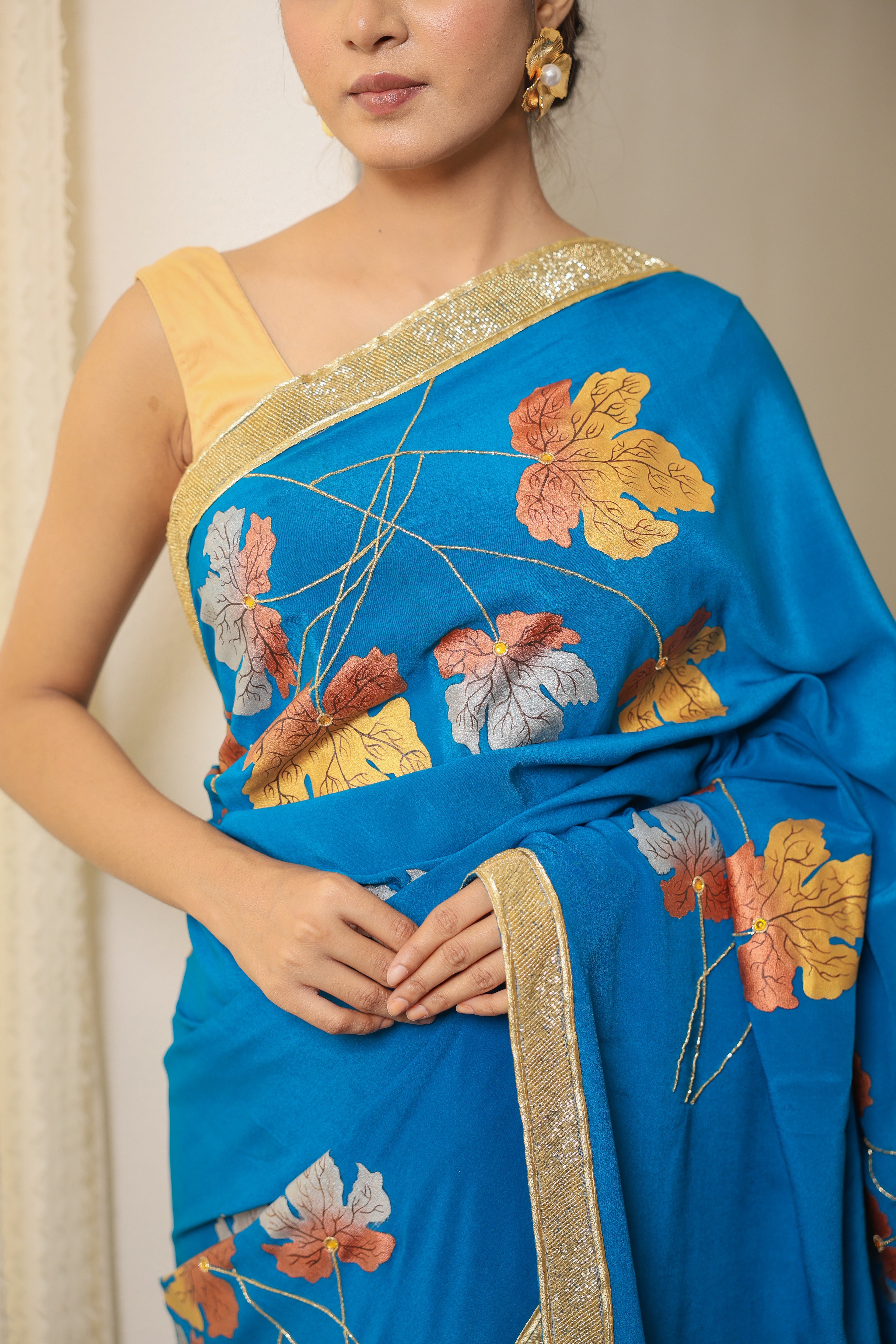 Handpainted and Hand embroidered Turquoise Pure Crepe Silk Golden Maple Saree