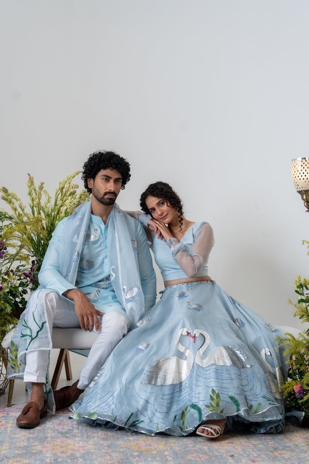 Handpainted and Handembroidered Pastel Blue Swan Lehenga and Kurta Twin Outfit