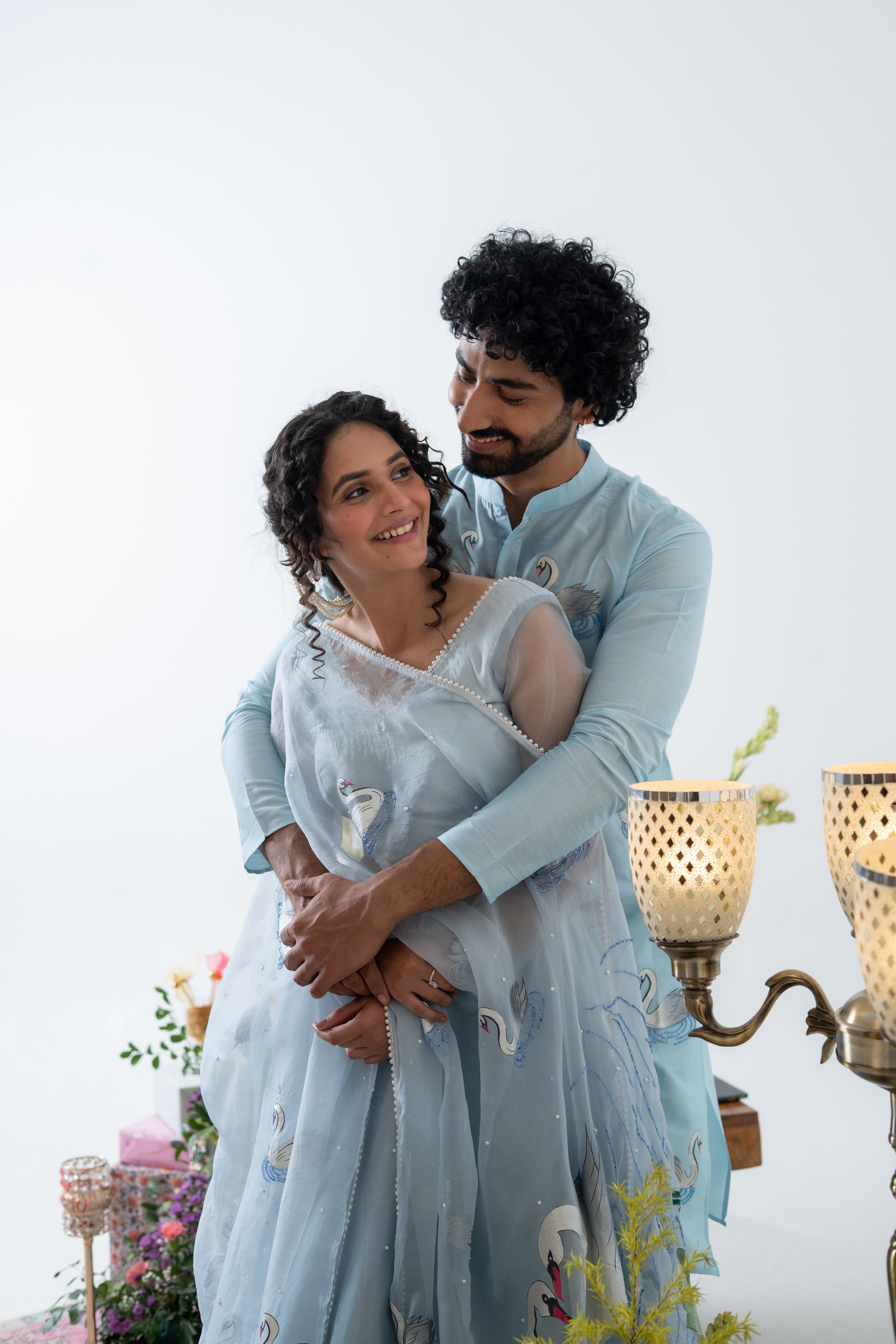 Handpainted and Handembroidered Pastel Blue Swan Lehenga and Kurta Twin Outfit