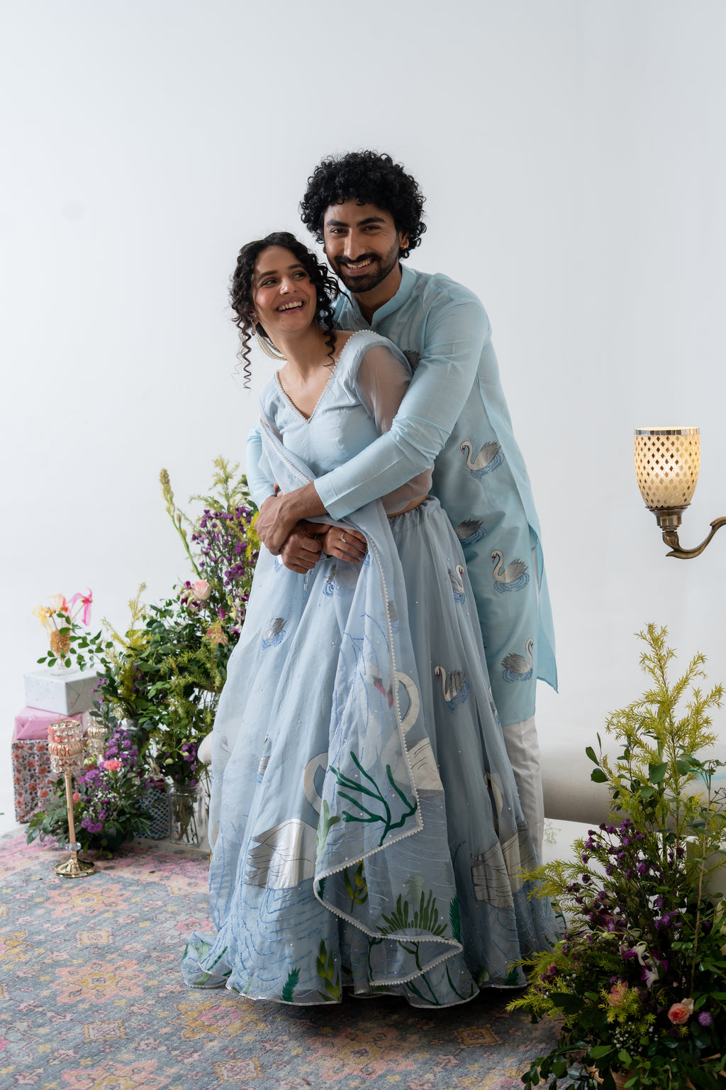 Handpainted and Handembroidered Pastel Blue Swan Lehenga and Kurta Twin Outfit