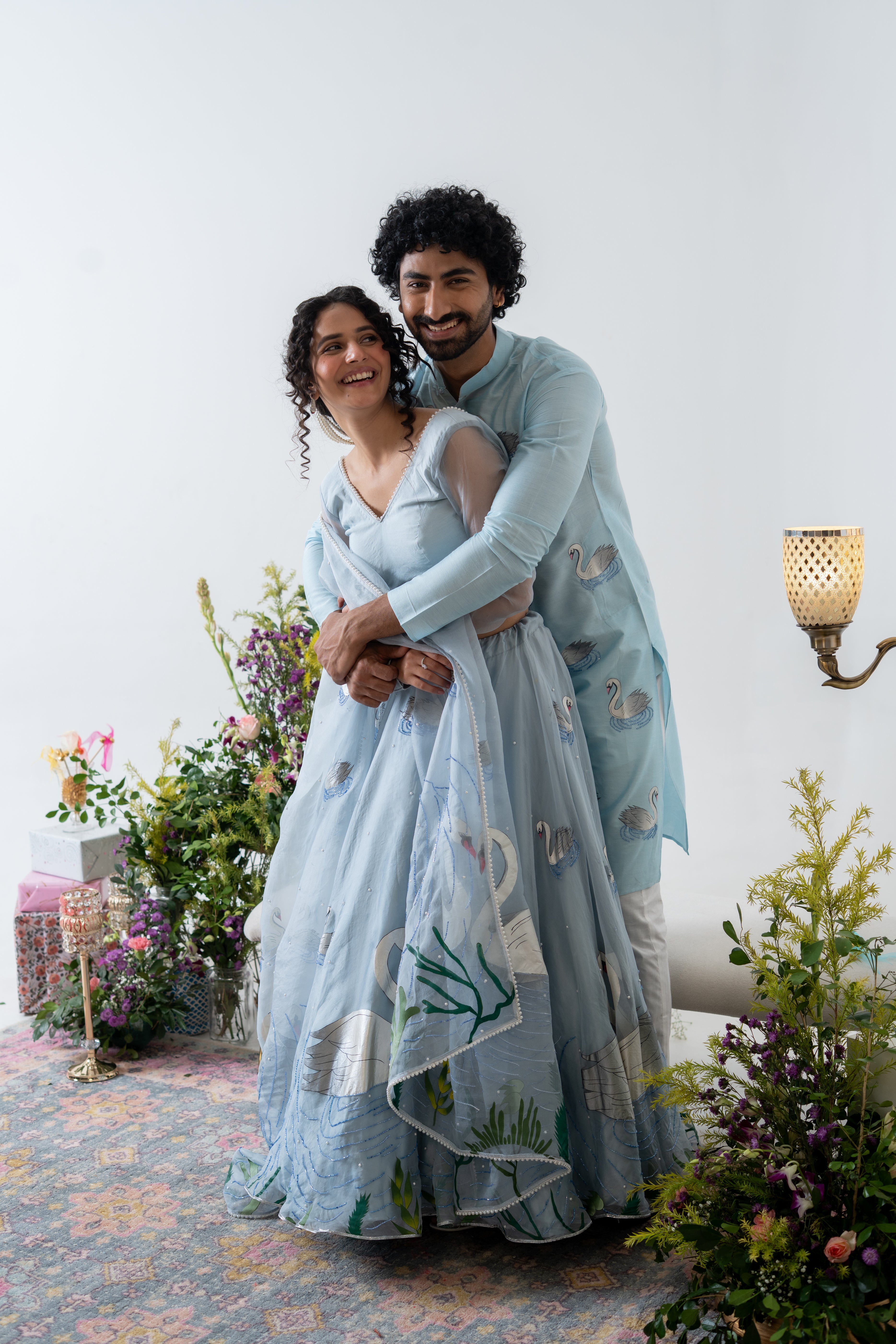 Handpainted and Handembroidered Pastel Blue Swan Lehenga and Kurta Twin Outfit