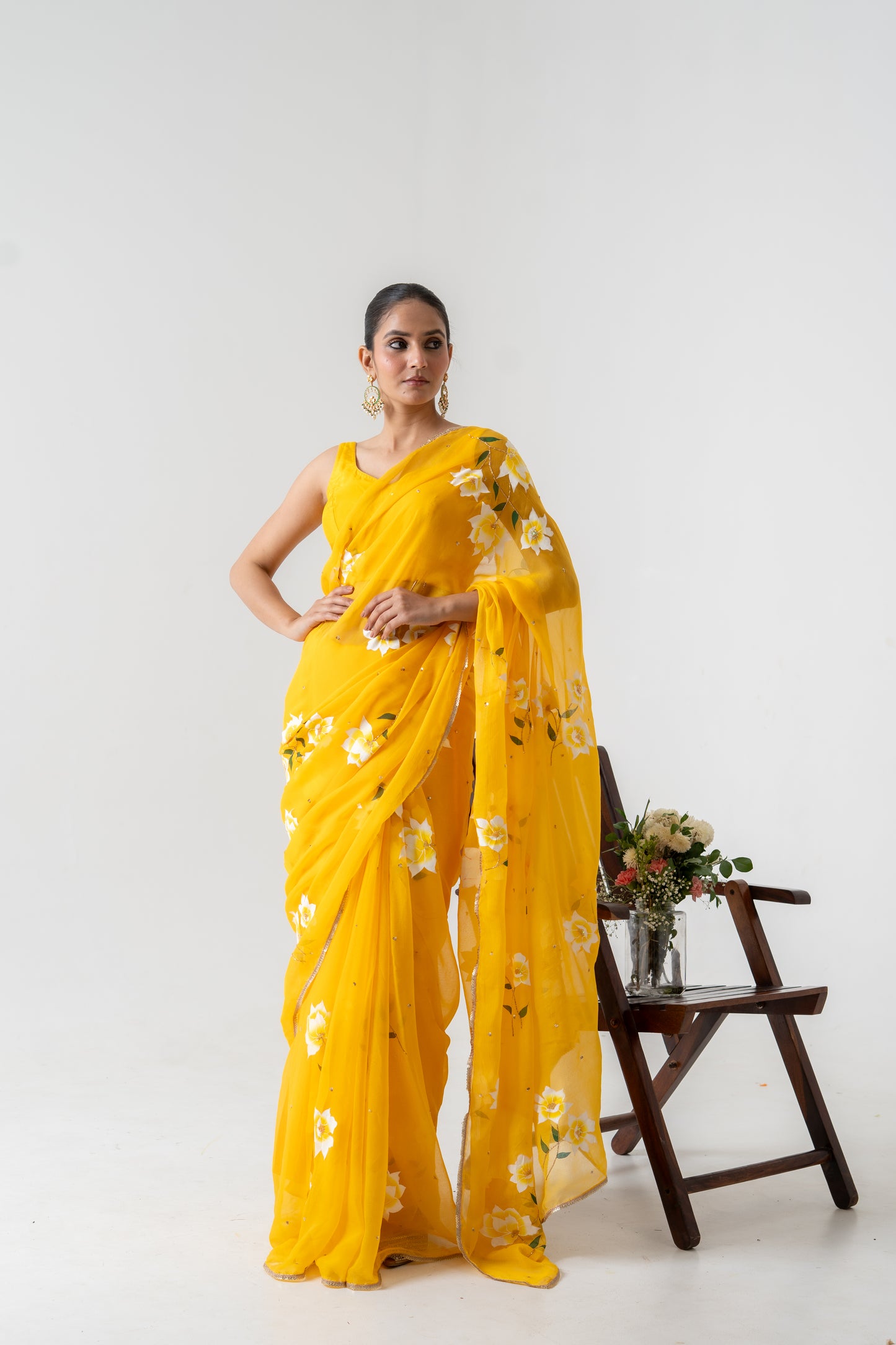 Sun-Drenched Elegance: Hand-Painted Yellow Chiffon Saree with Sequin Detailing