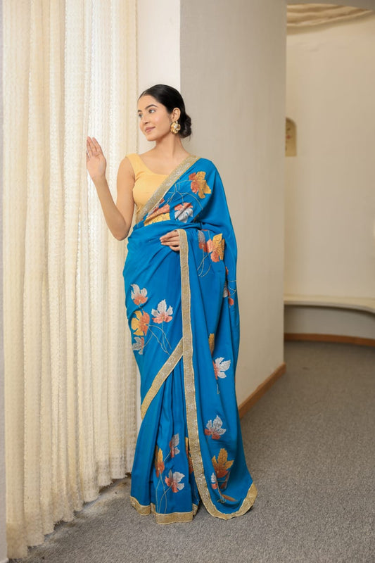 Hand-Painted Turquoise Pure Crepe Silk Saree