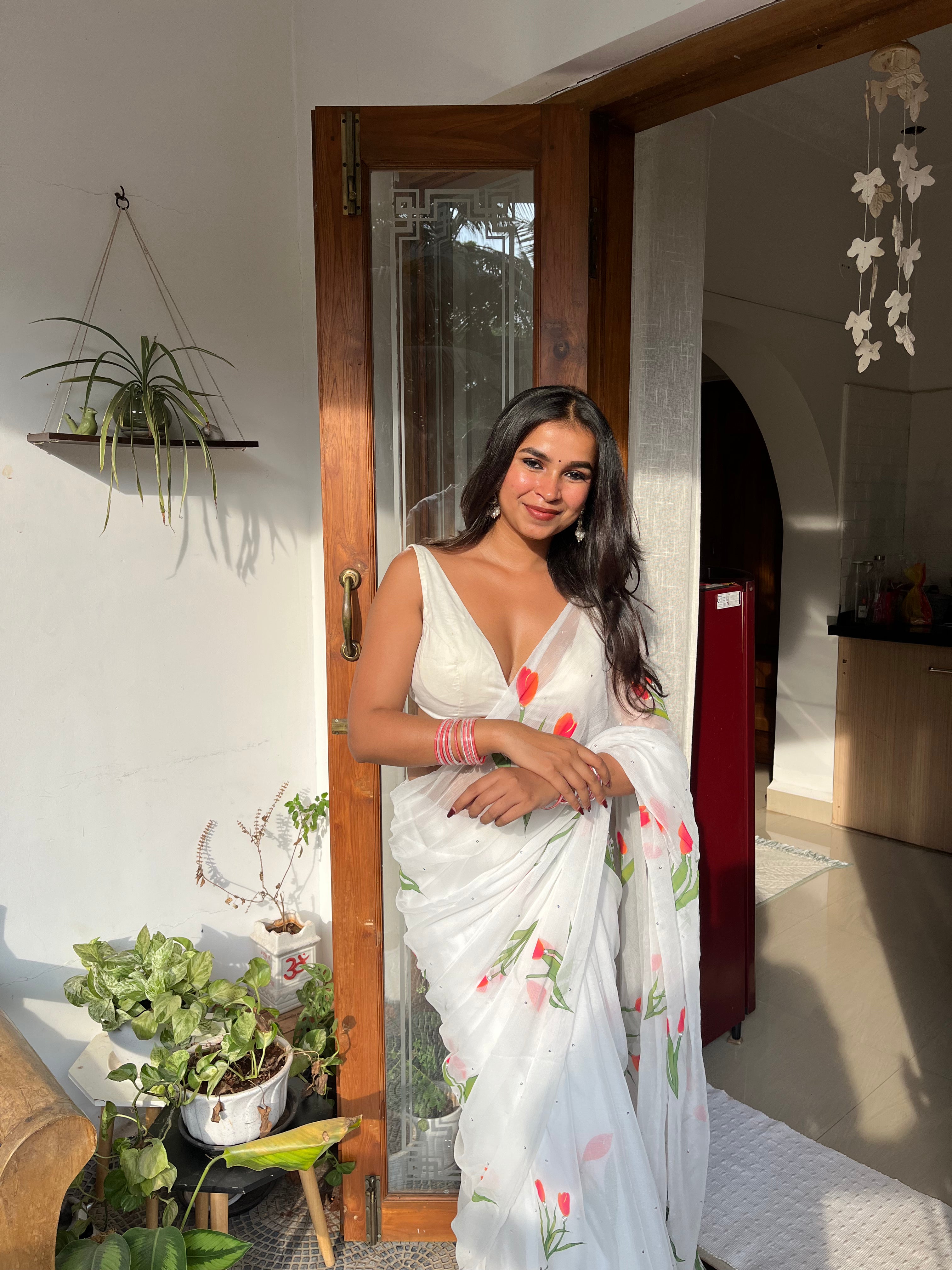 Handpainted and Hand embroidered White Chiffon Tulip Saree