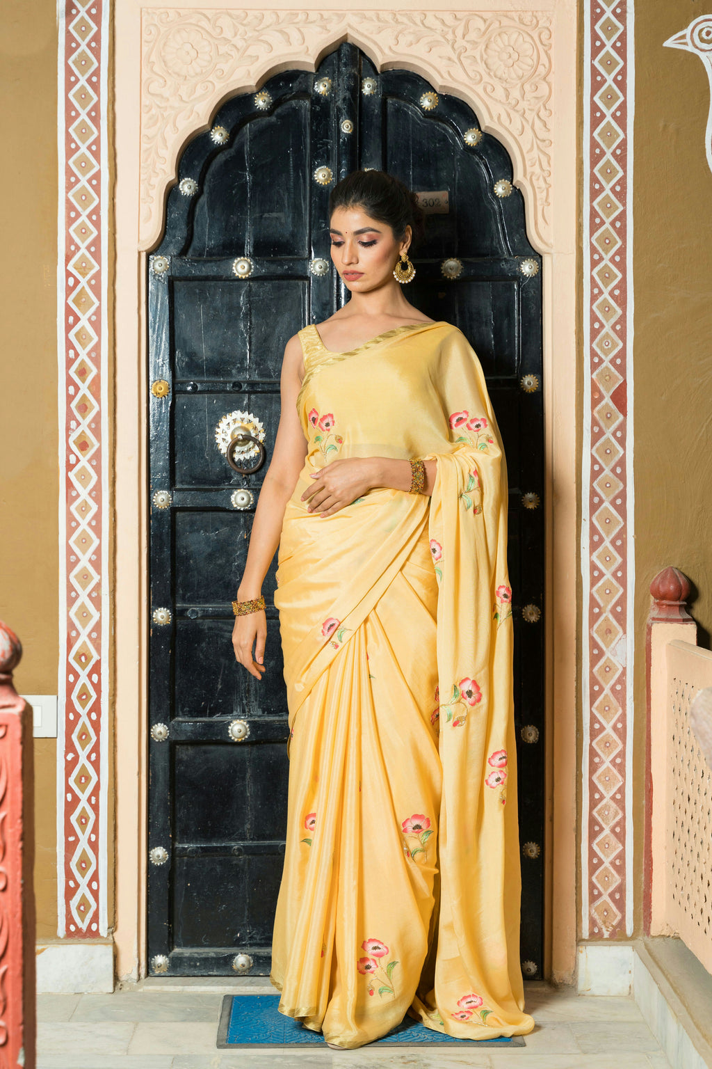 Hand-Painted and Hand-Embroidered Golden Yellow Pure Crepe Silk Saree