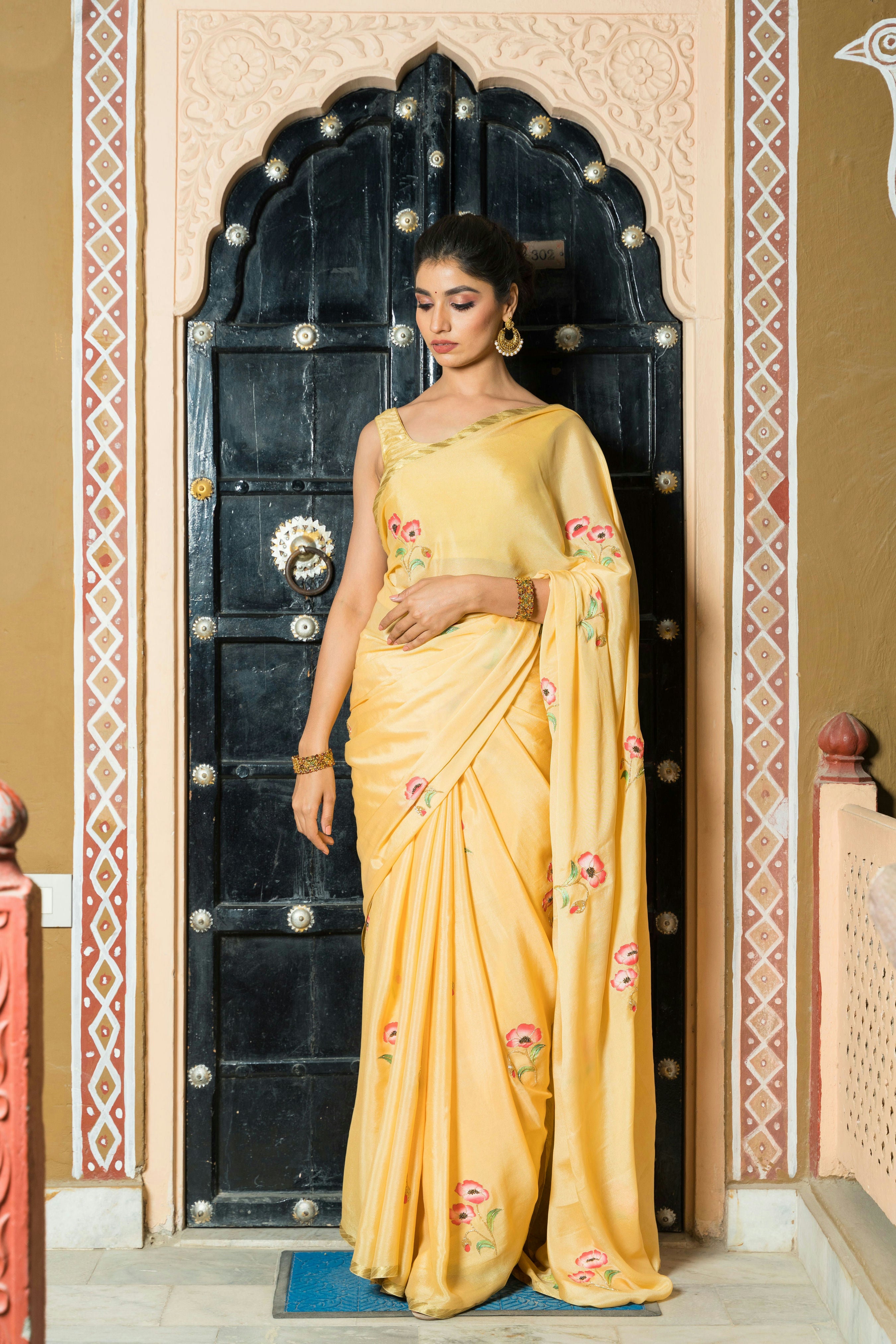Hand-Painted and Hand-Embroidered Golden Yellow Pure Crepe Silk Saree