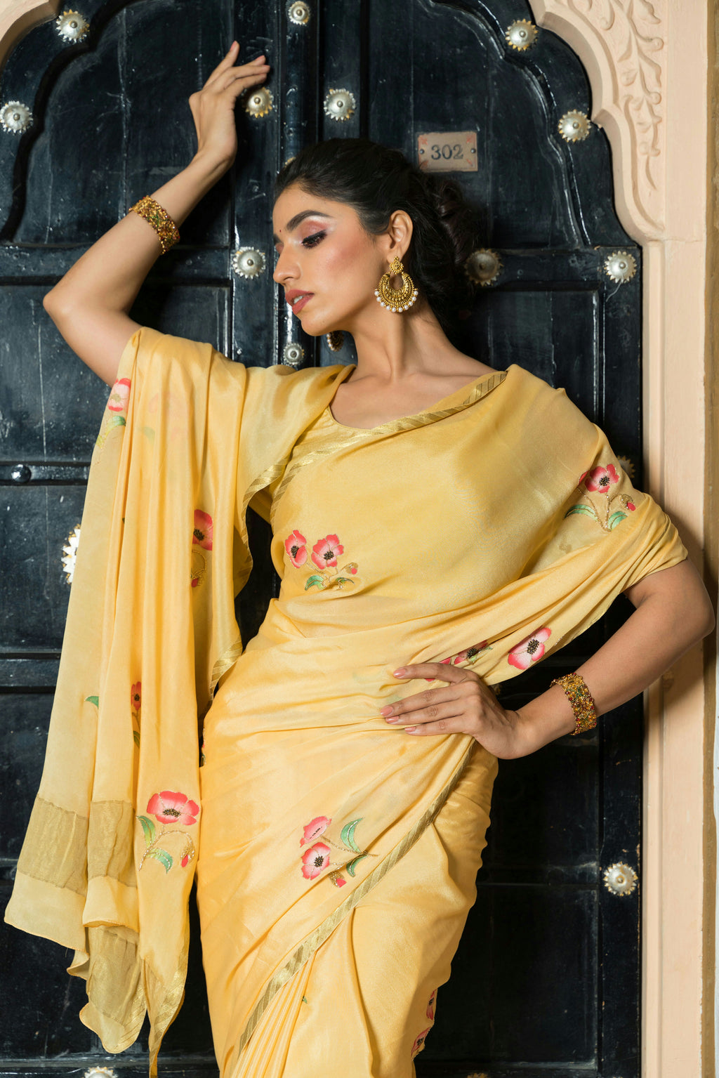 Hand-Painted and Hand-Embroidered Golden Yellow Pure Crepe Silk Saree