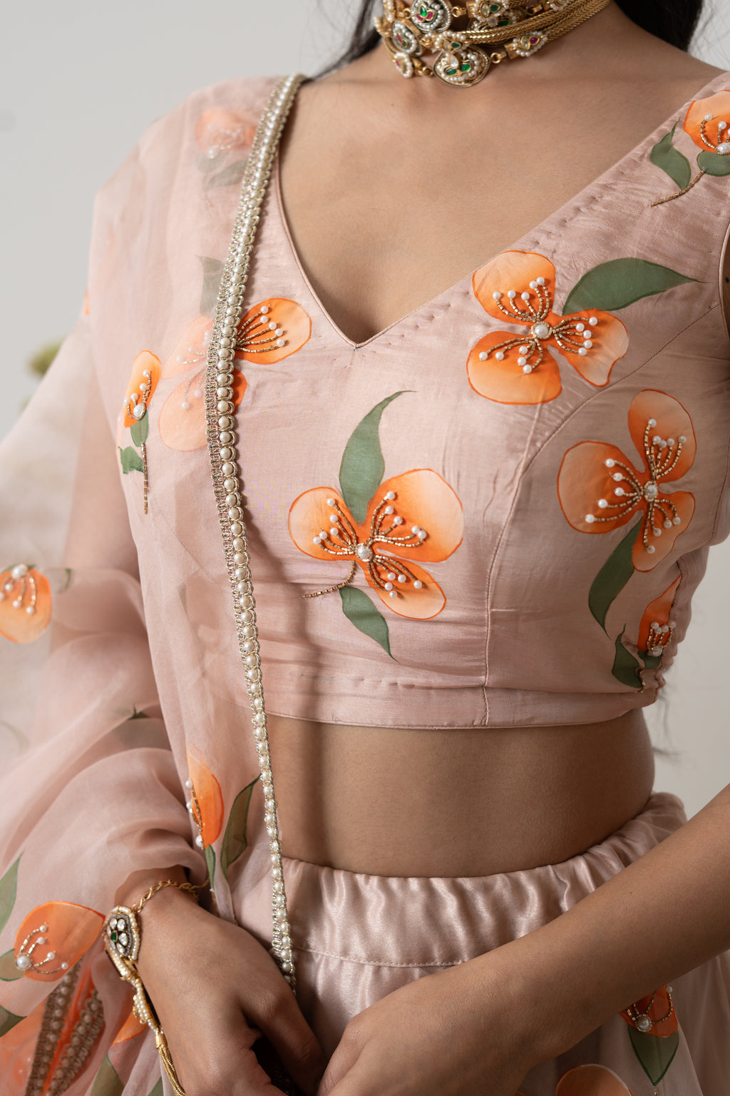 Handpainted and Handembroiderd peach Silk Organza Floral Lehenga