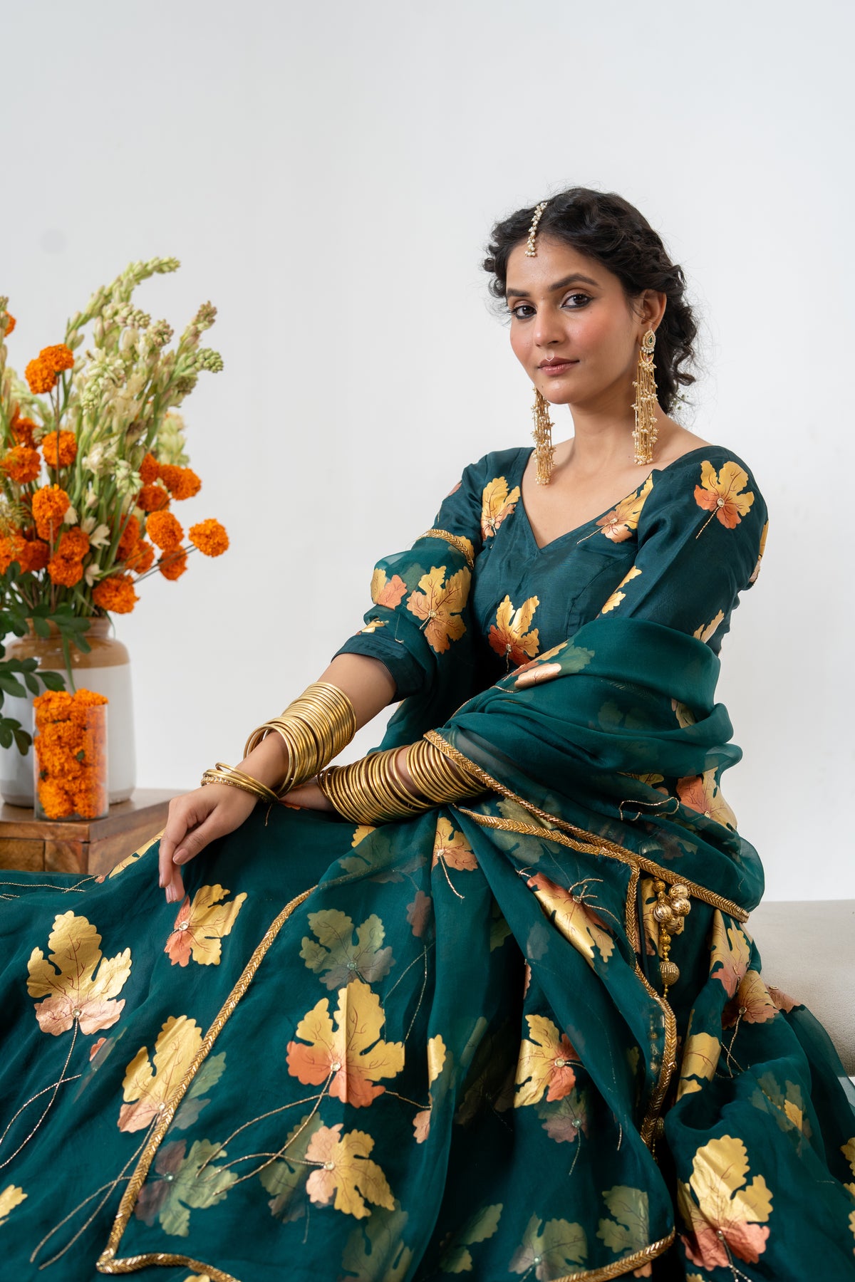 Hand-painted and Hand embroidered Bottle Green Silk Organza Golden Maple Lehenga