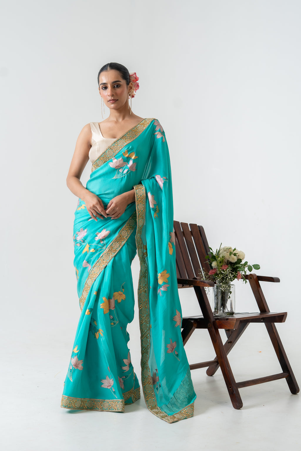 Handpainted and Hand embroidered Green Pure Crepe Silk Saree