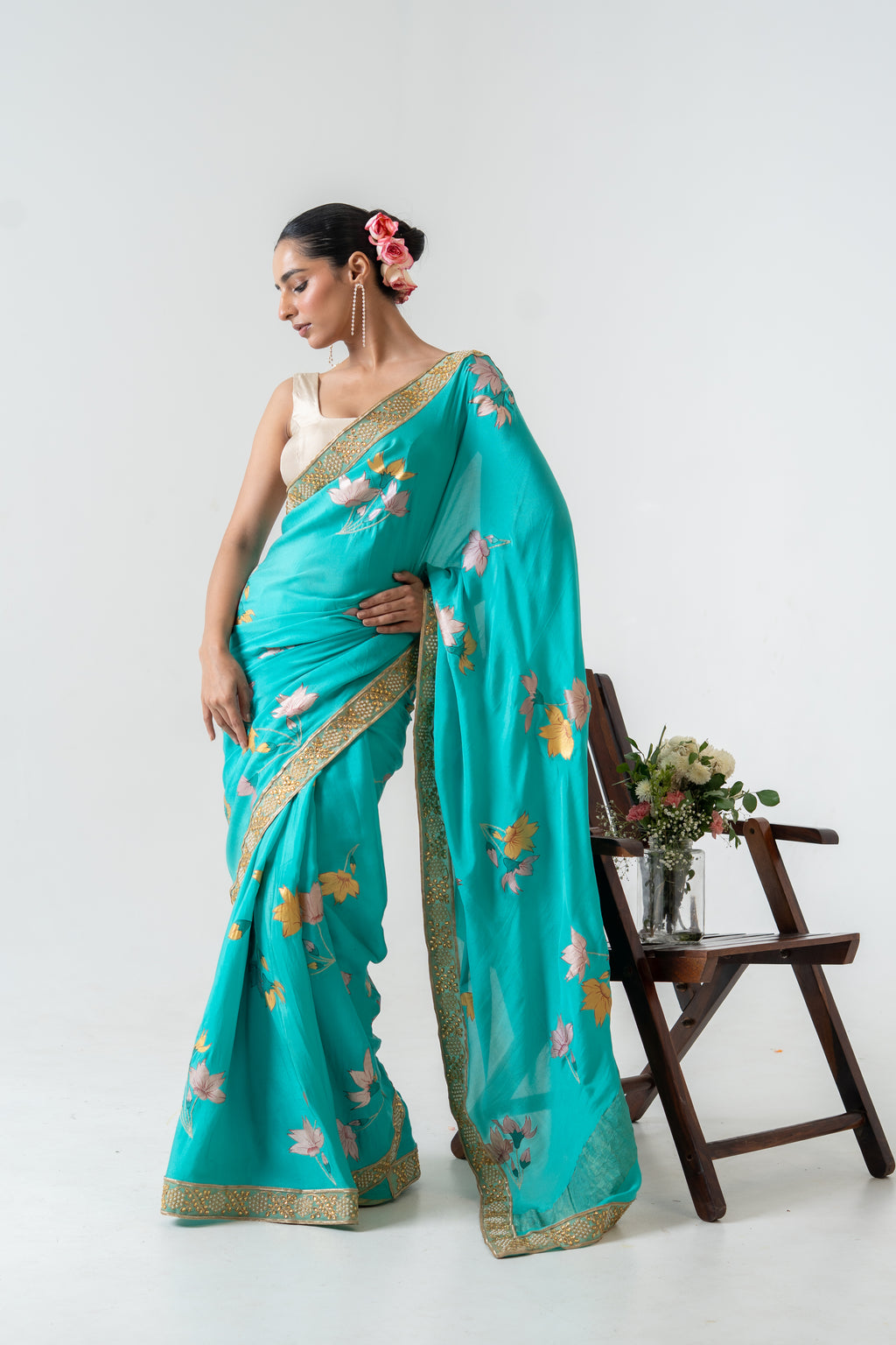 Handpainted and Hand embroidered Green Pure Crepe Silk Saree