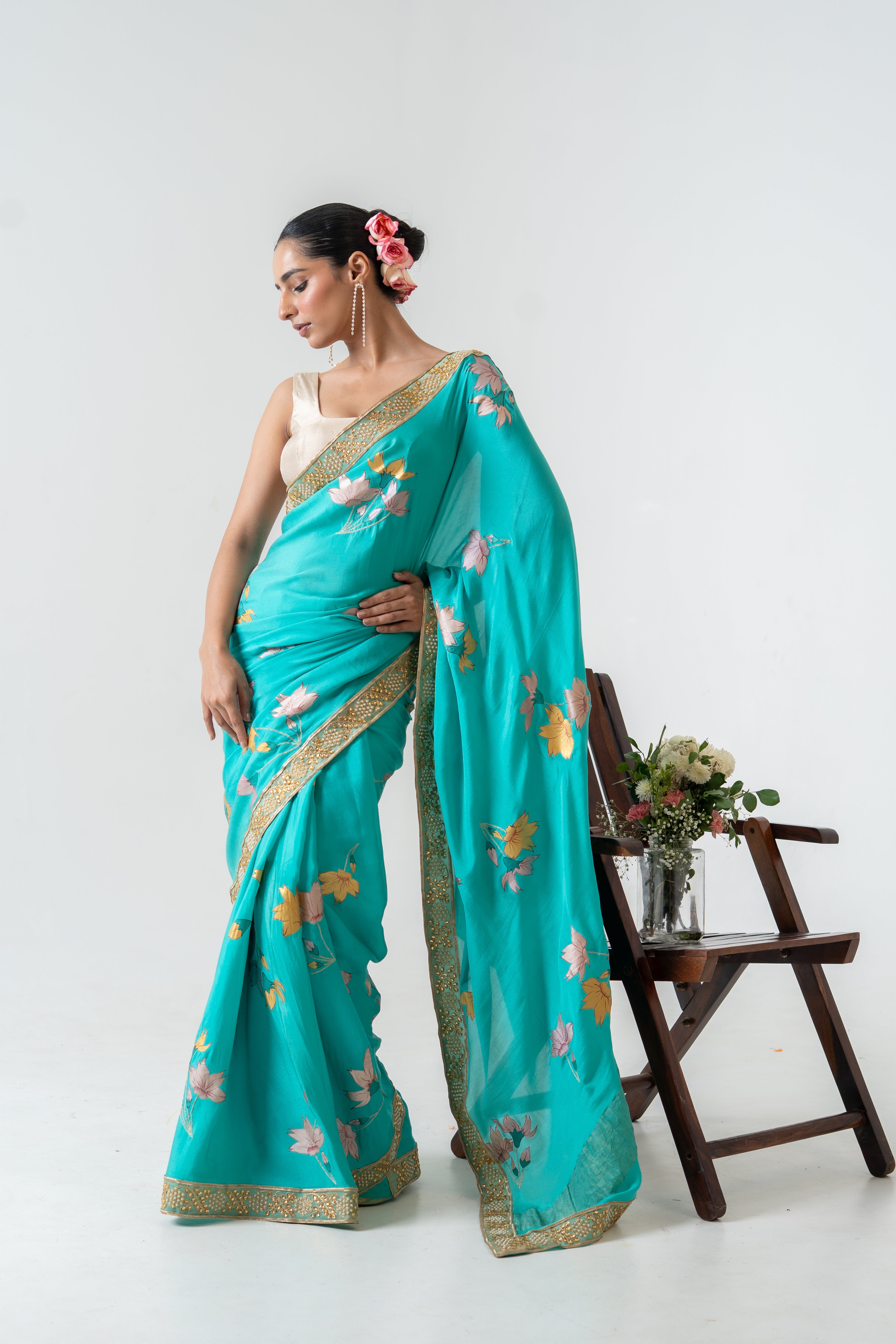 Handpainted and Hand embroidered Green Pure Crepe Silk Saree
