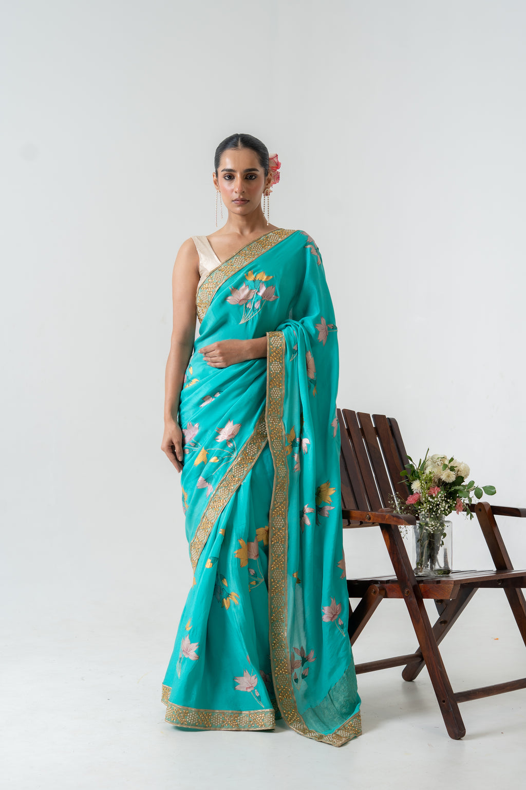 Handpainted and Hand embroidered Green Pure Crepe Silk Saree