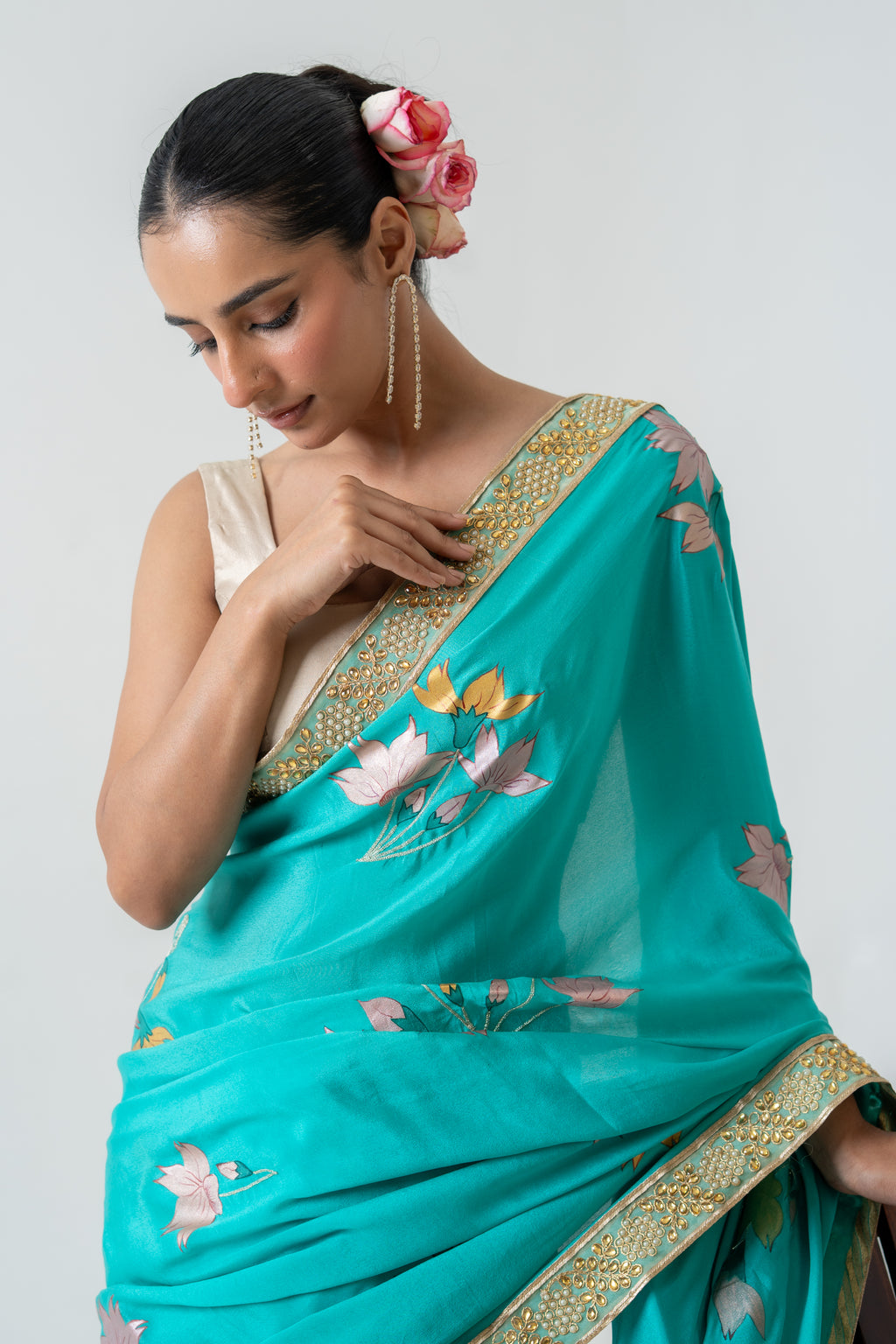 Handpainted and Hand embroidered Green Pure Crepe Silk Saree