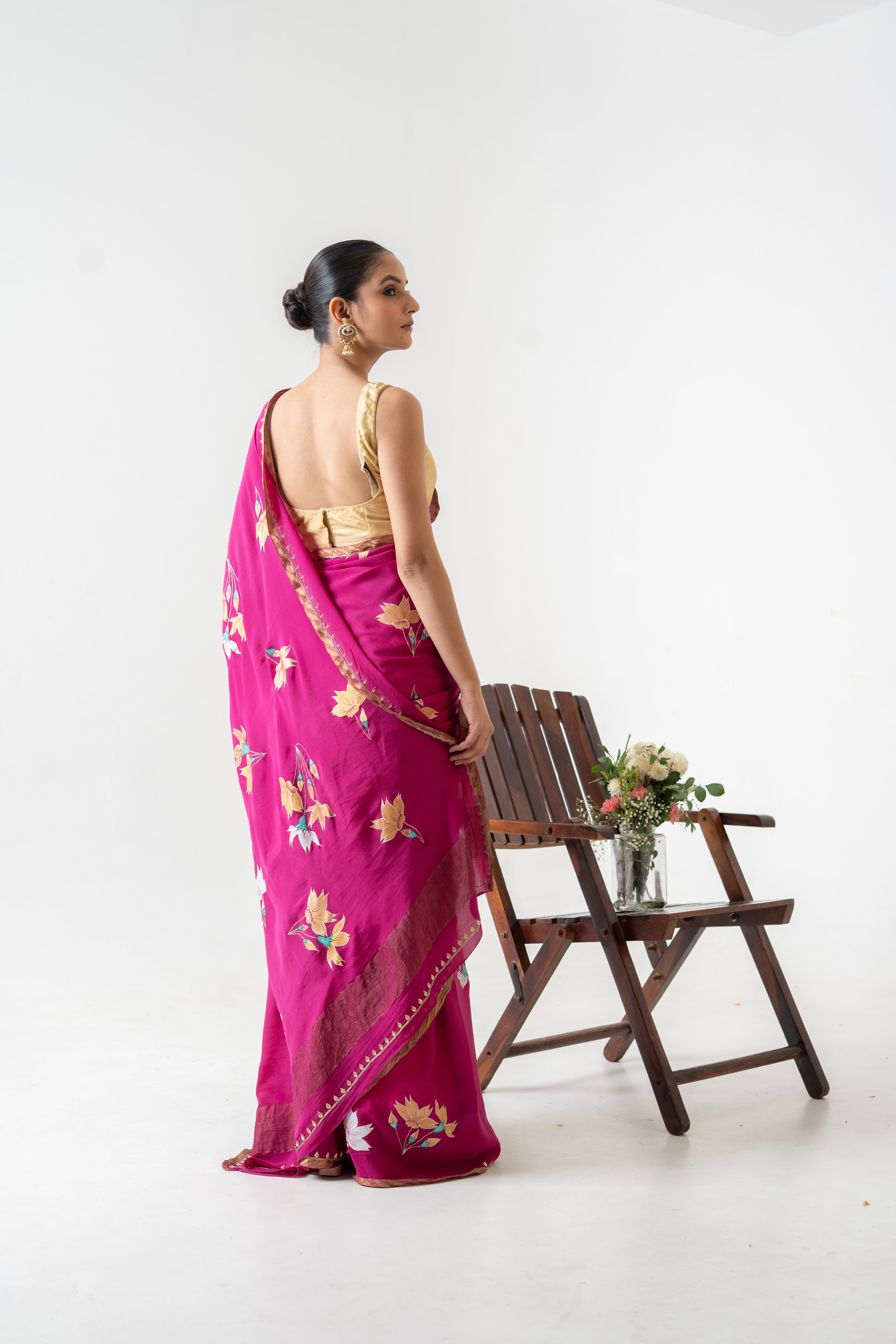 Handpainted and Hand embroidered Magenta Pure Crepe Silk saree
