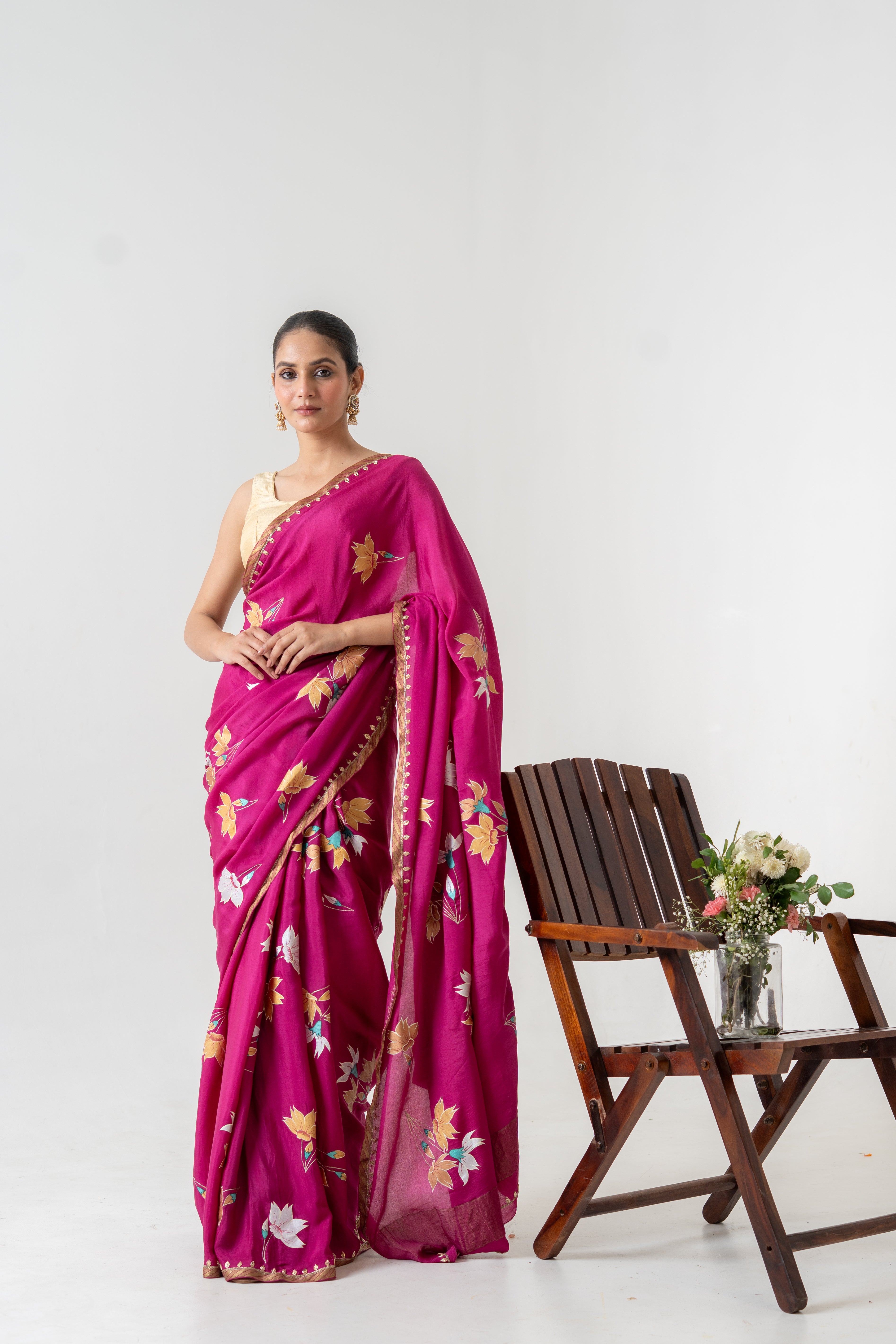 Handpainted and Hand embroidered Magenta Pure Crepe Silk saree