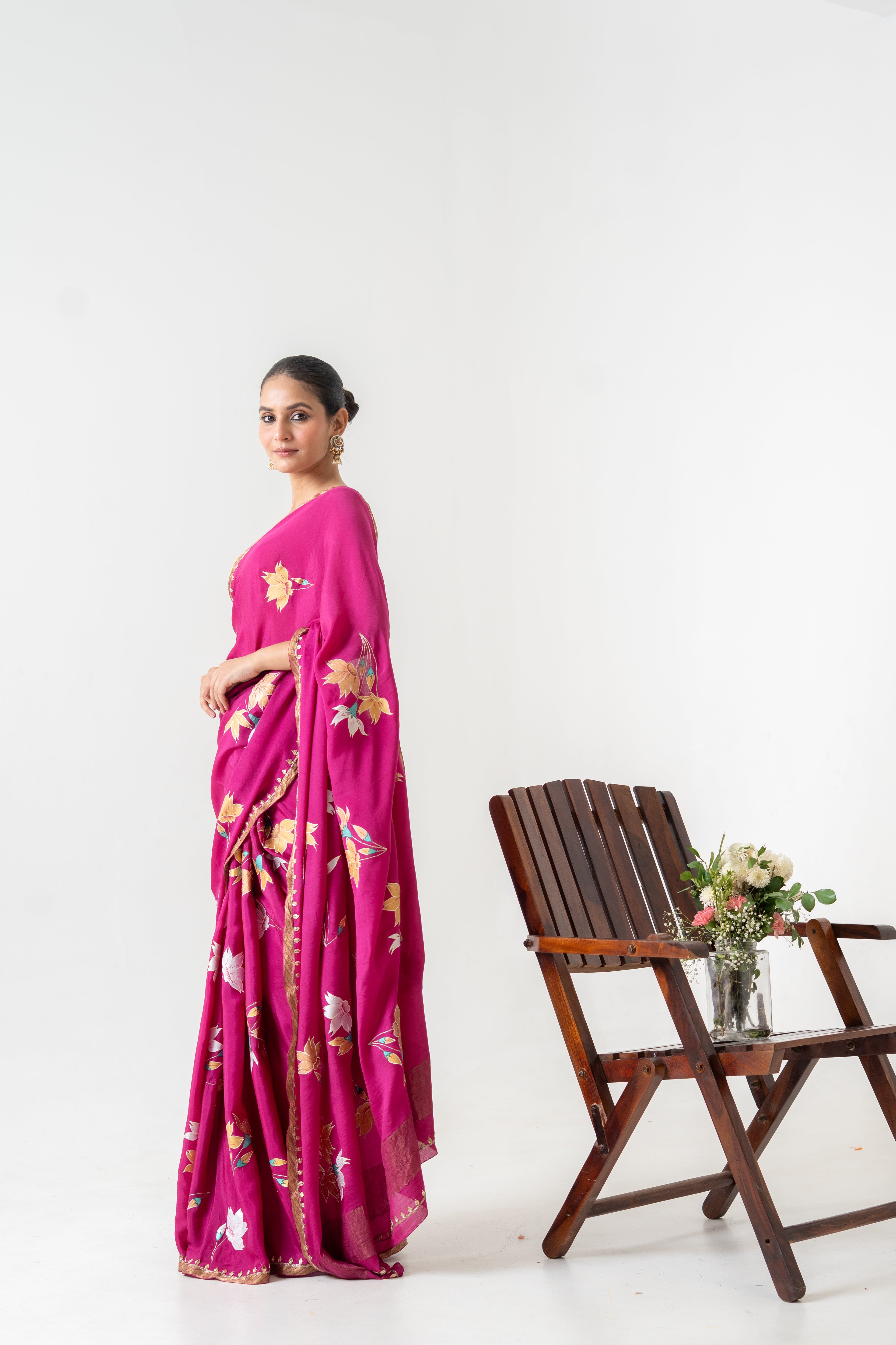 Handpainted and Hand embroidered Magenta Pure Crepe Silk saree