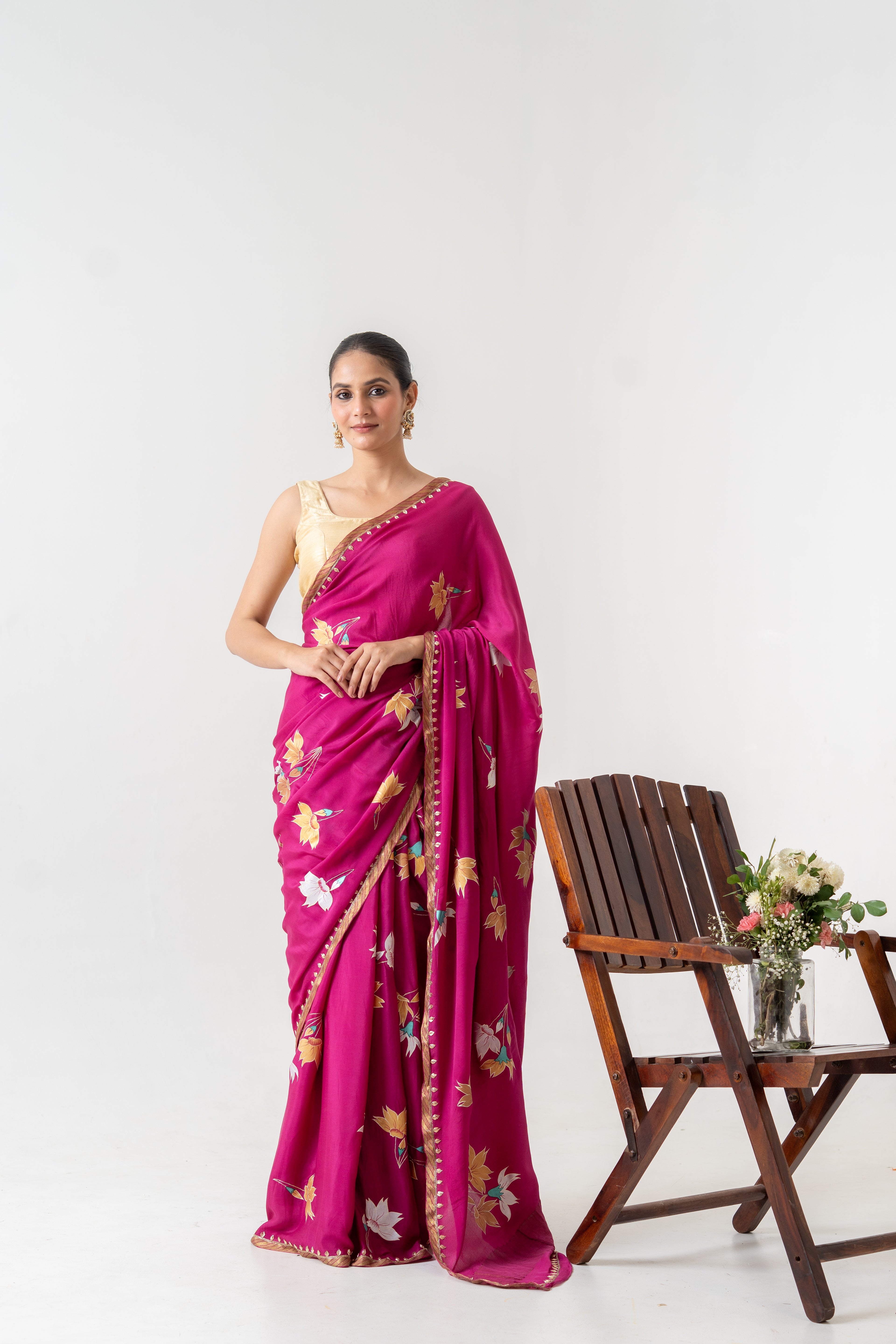 Handpainted and Hand embroidered Magenta Pure Crepe Silk saree