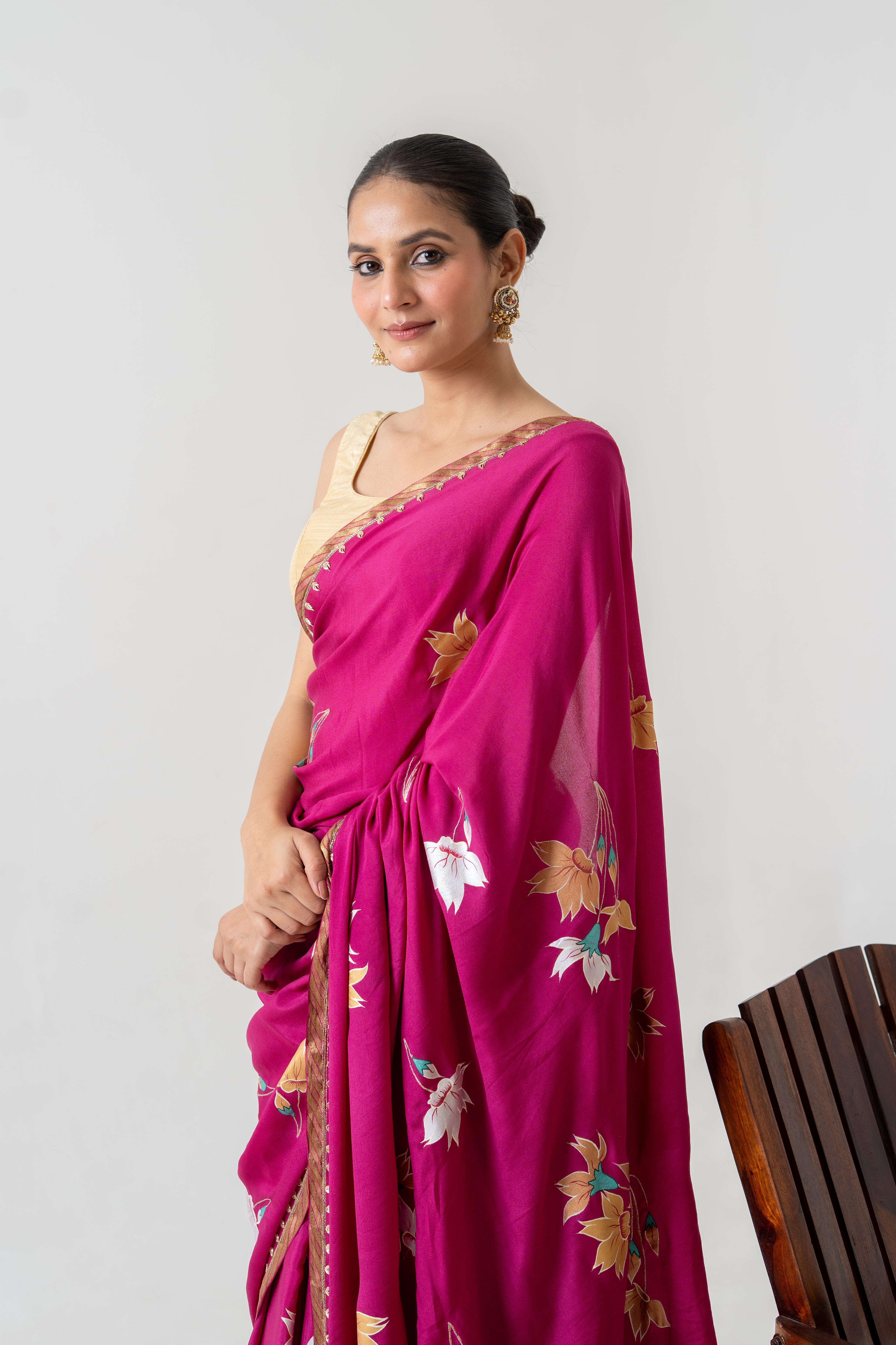Handpainted and Hand embroidered Magenta Pure Crepe Silk saree