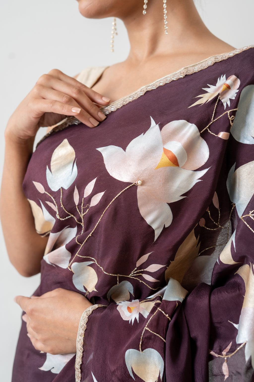Handpainted and Hand embroidered Wine Crepe Saree