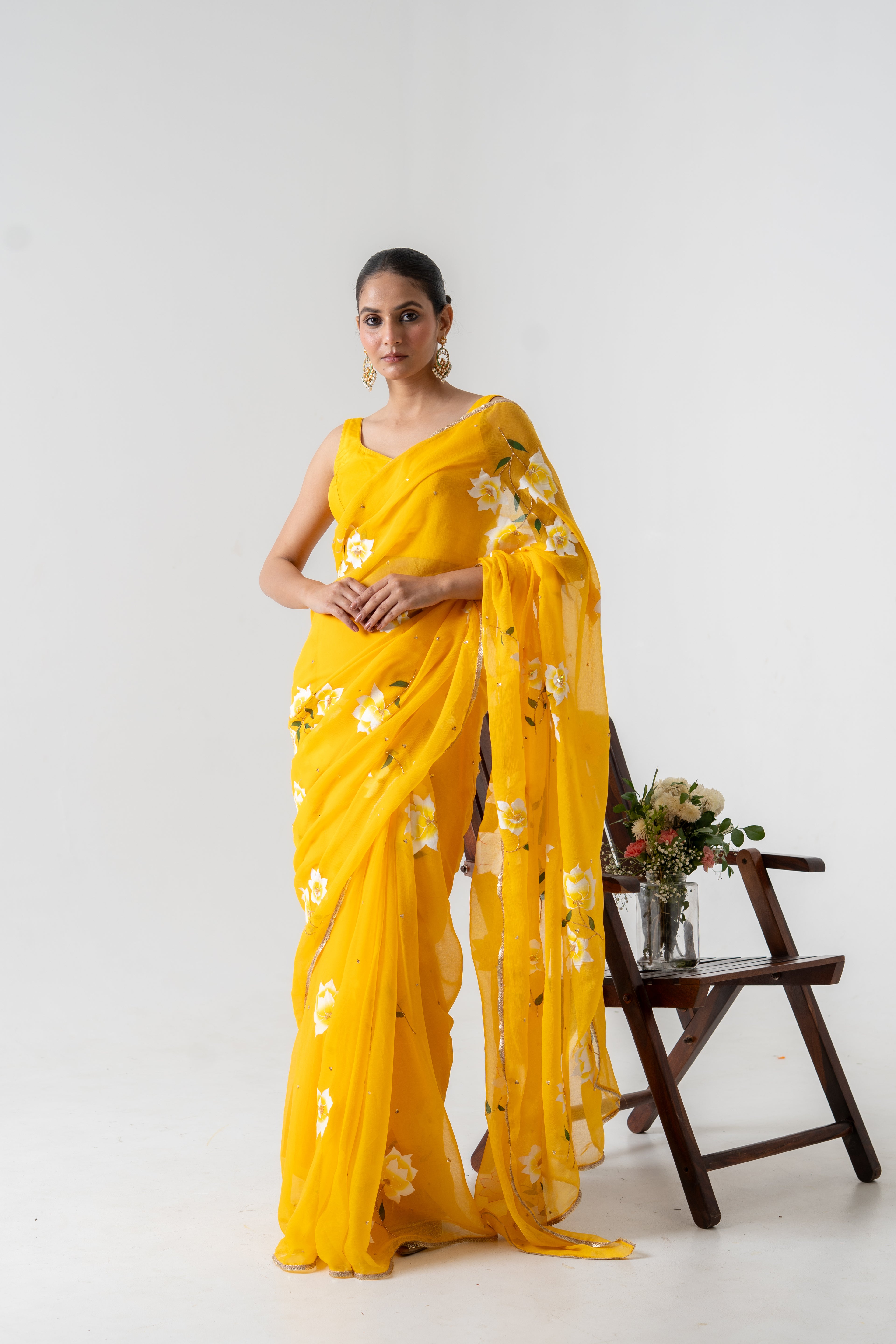 Handpainted and Hand embroidered Yellow Chiffon white Rose Saree