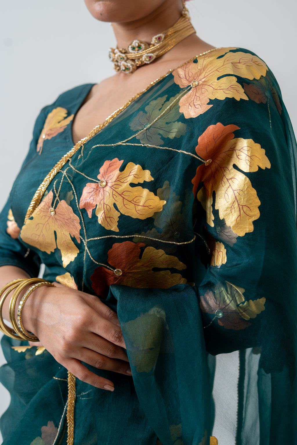 Handpainted and Hand embroidered Bottle Green Pure Silk Organza Golden Maple Saree