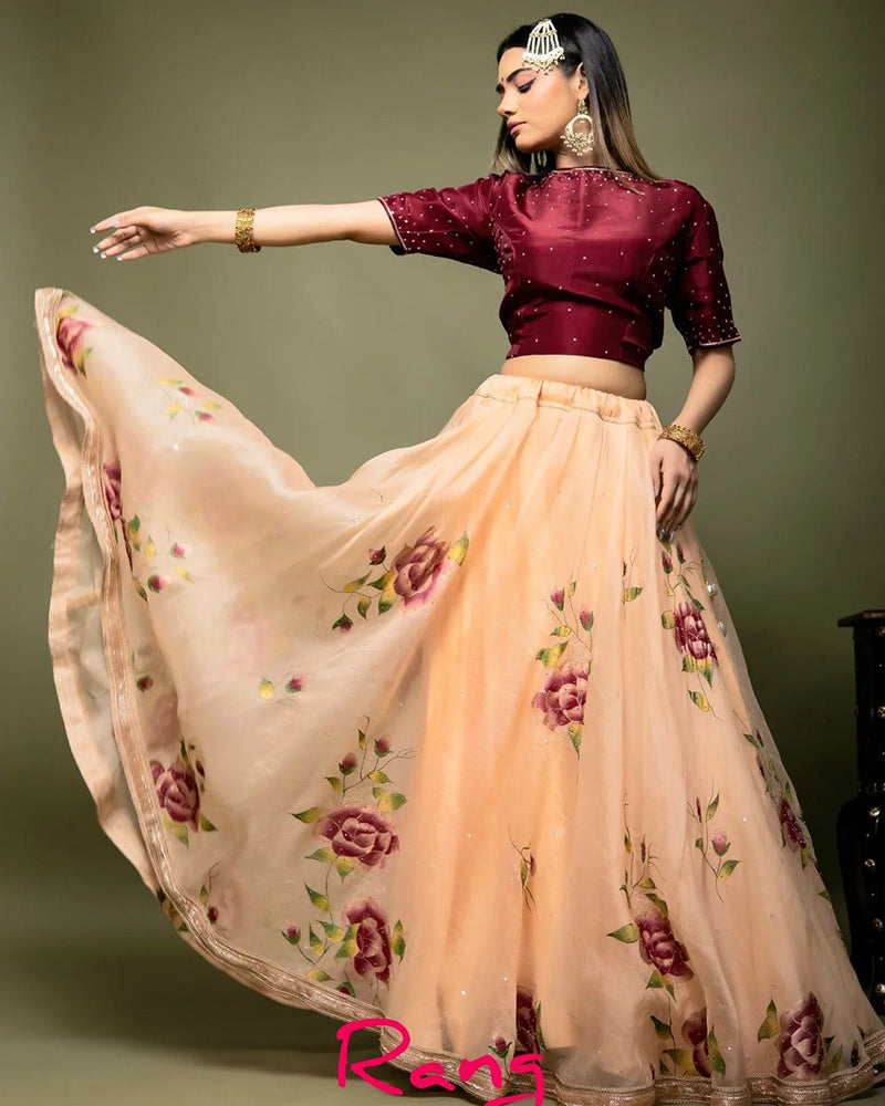 Handpainted and Hand embroidered Rose Gold Silk Organza Maroon Rose Lehenga