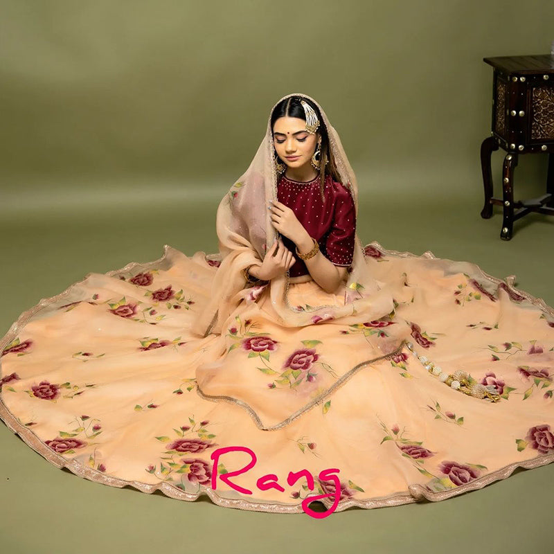 Handpainted and Hand embroidered Rose Gold Silk Organza Maroon Rose Lehenga
