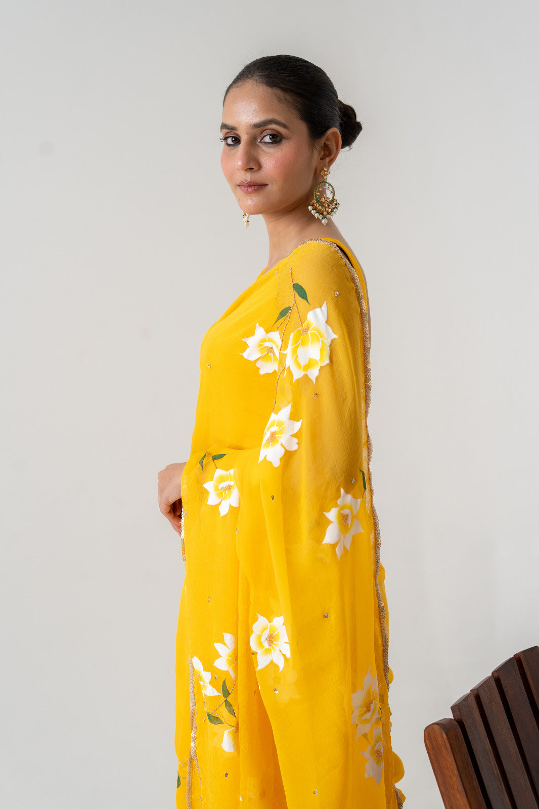 Sun-Drenched Elegance: Hand-Painted Yellow Chiffon Saree with Sequin Detailing
